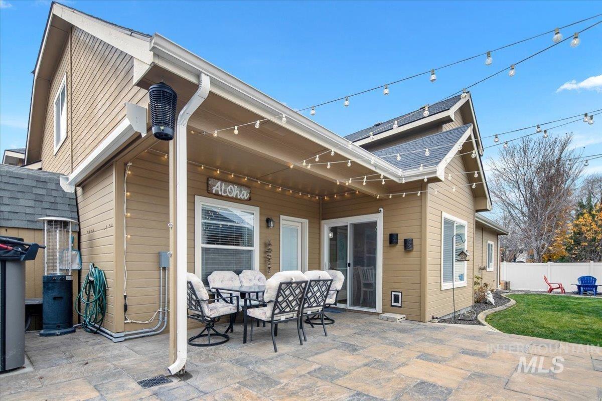 Rear view of house with a patio area