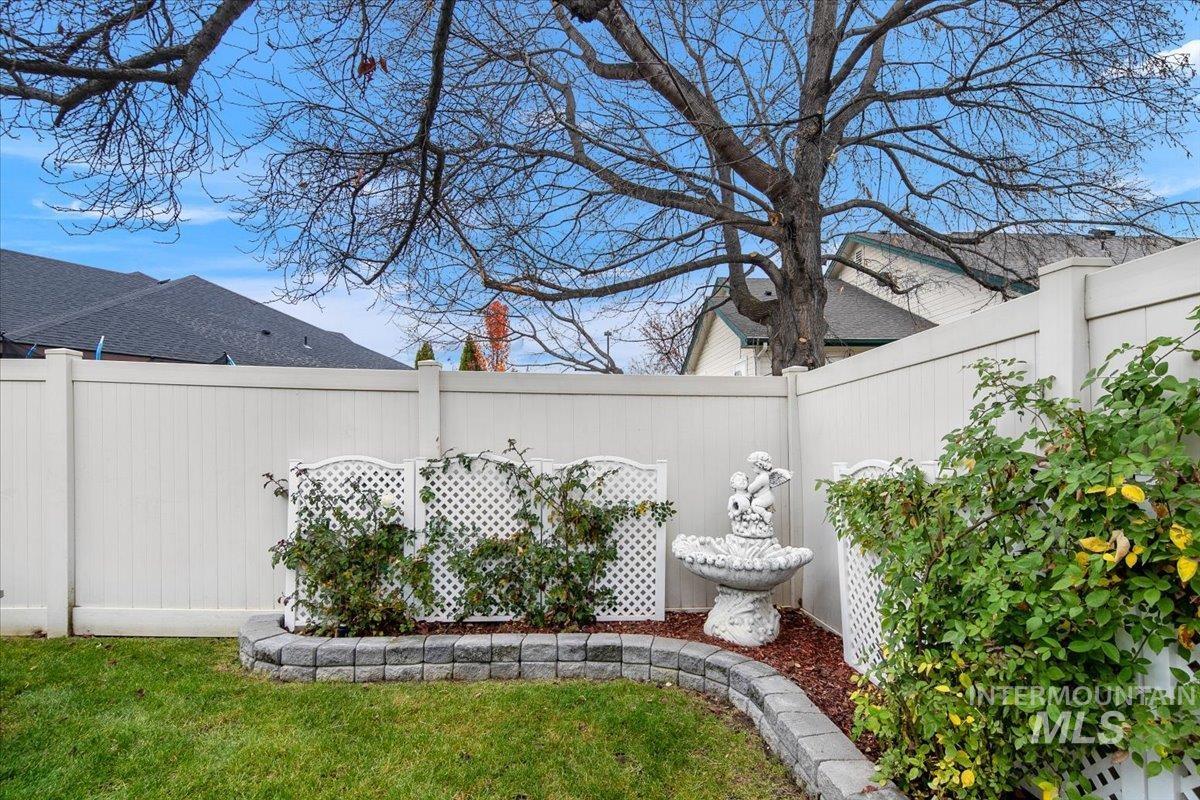 View of fenced backyard