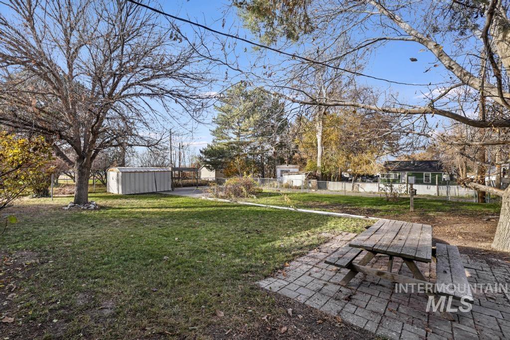 View of yard with a shed