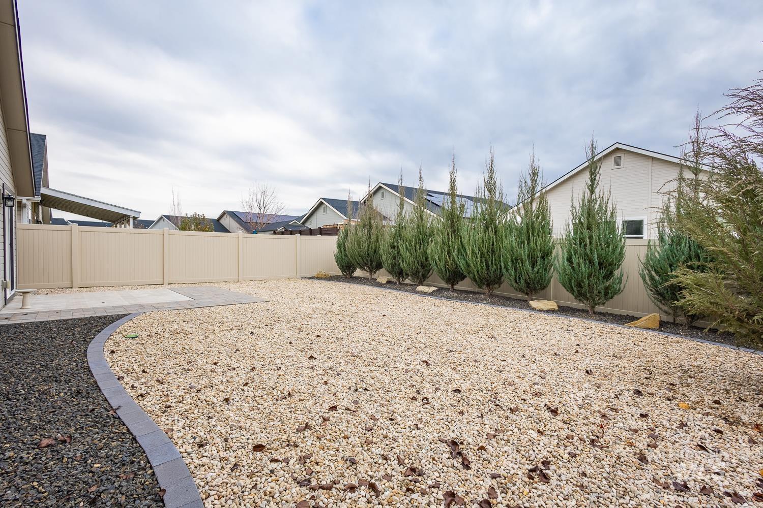 View of fenced backyard