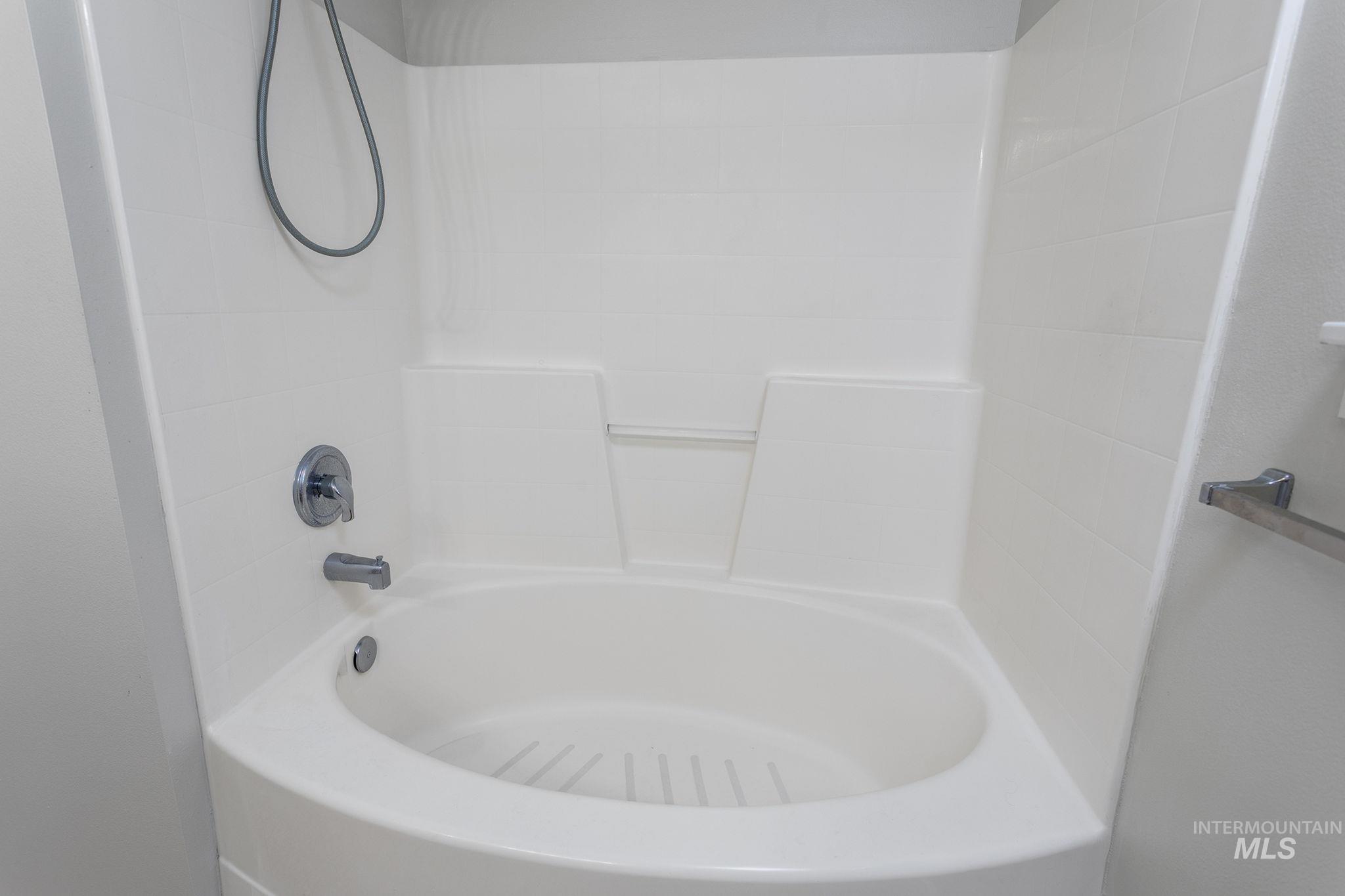 Full bath with shower / washtub combination