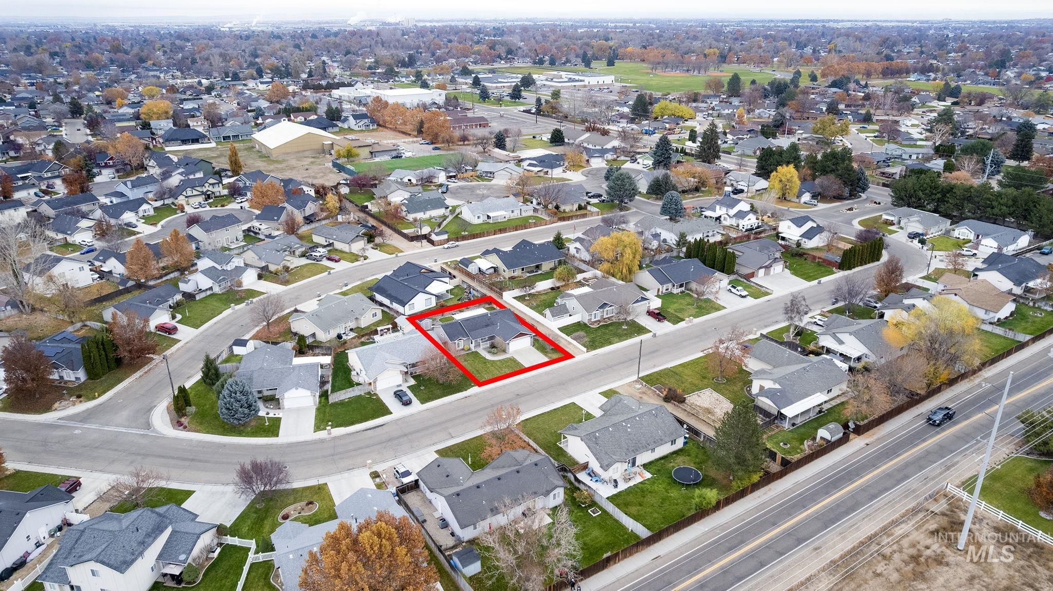 Aerial perspective of suburban area with property boundaries highlighted