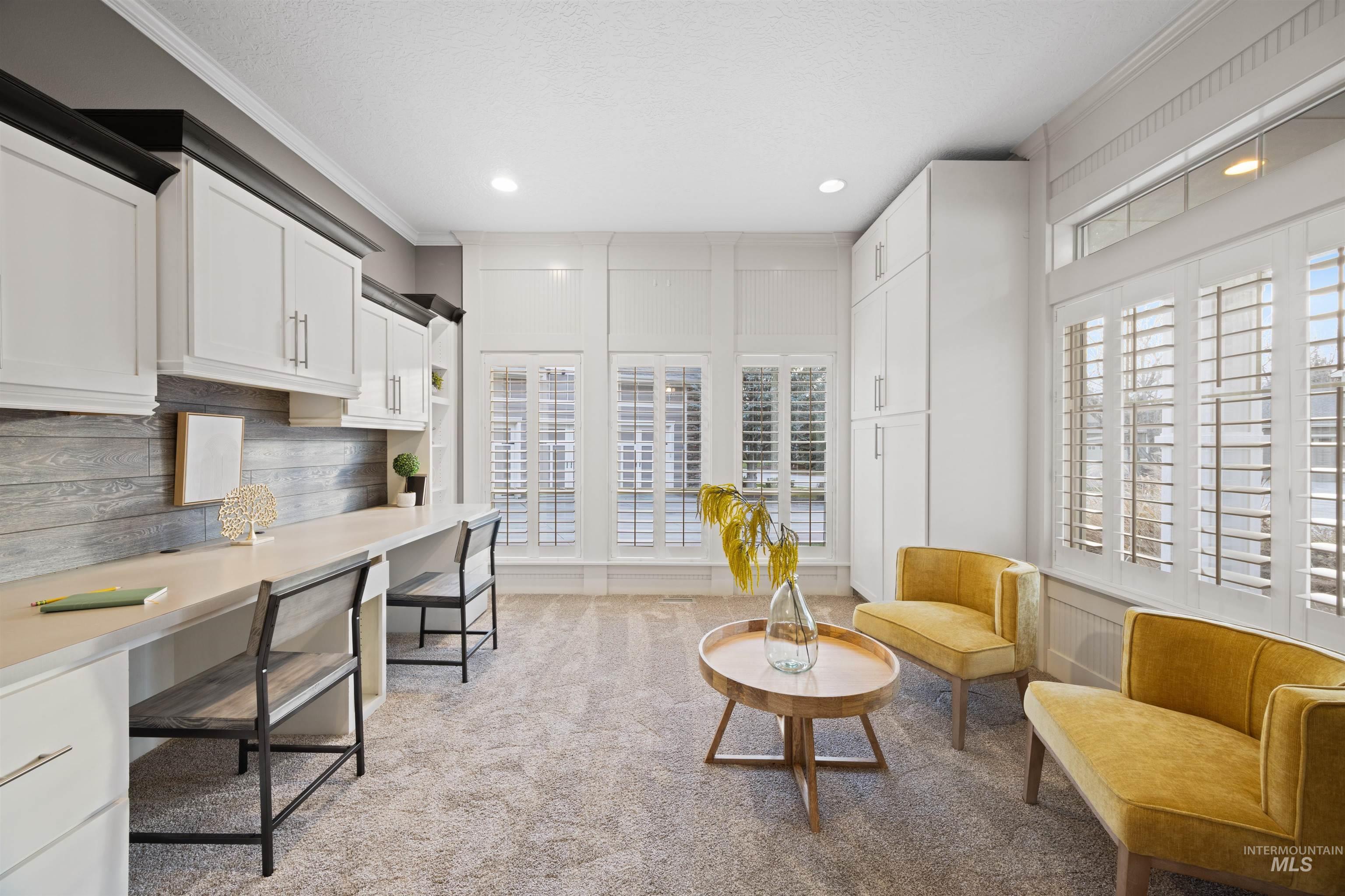 Home office with crown molding, light carpet, a textured ceiling, and recessed lighting