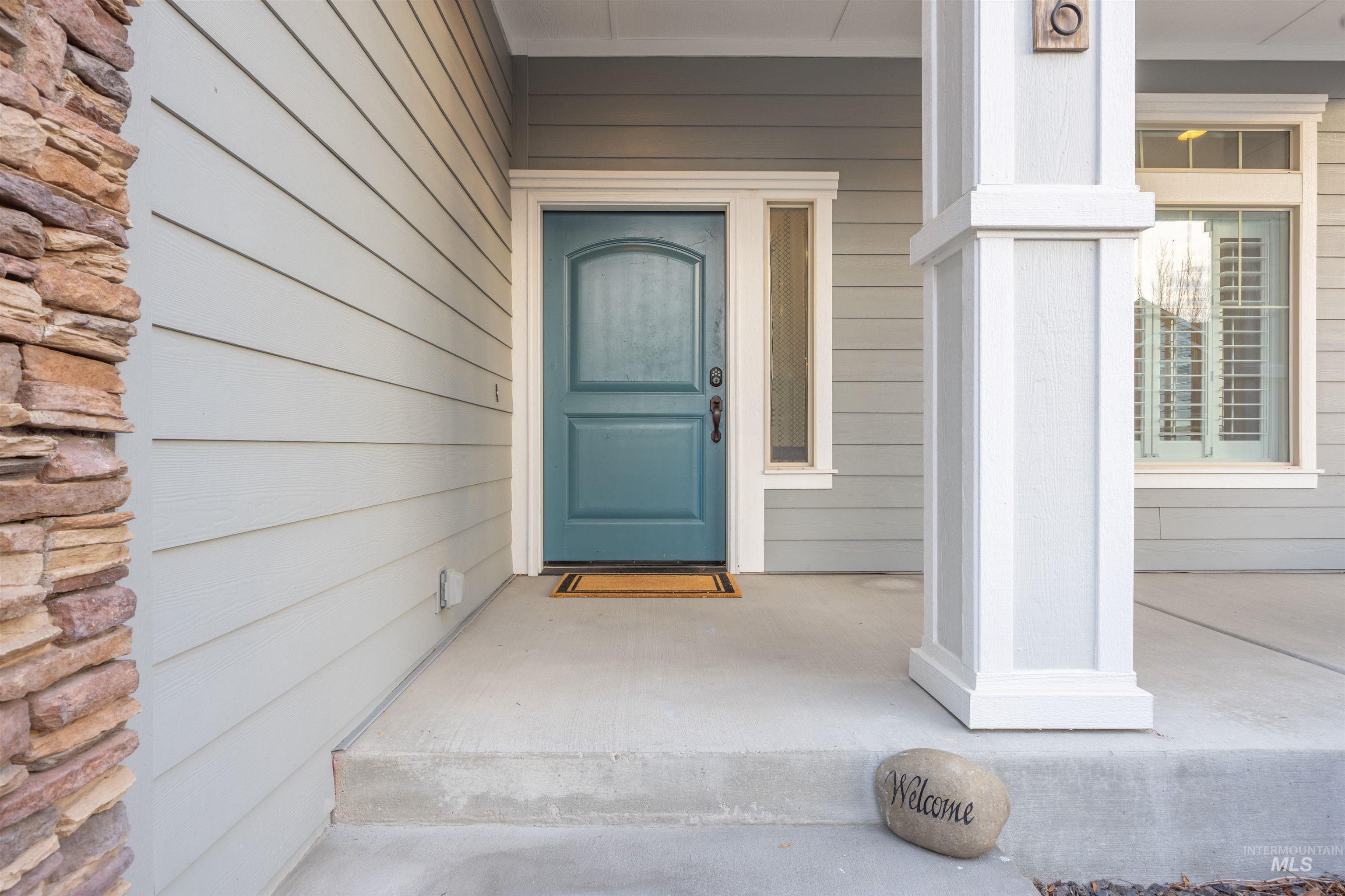 Doorway to property with a porch