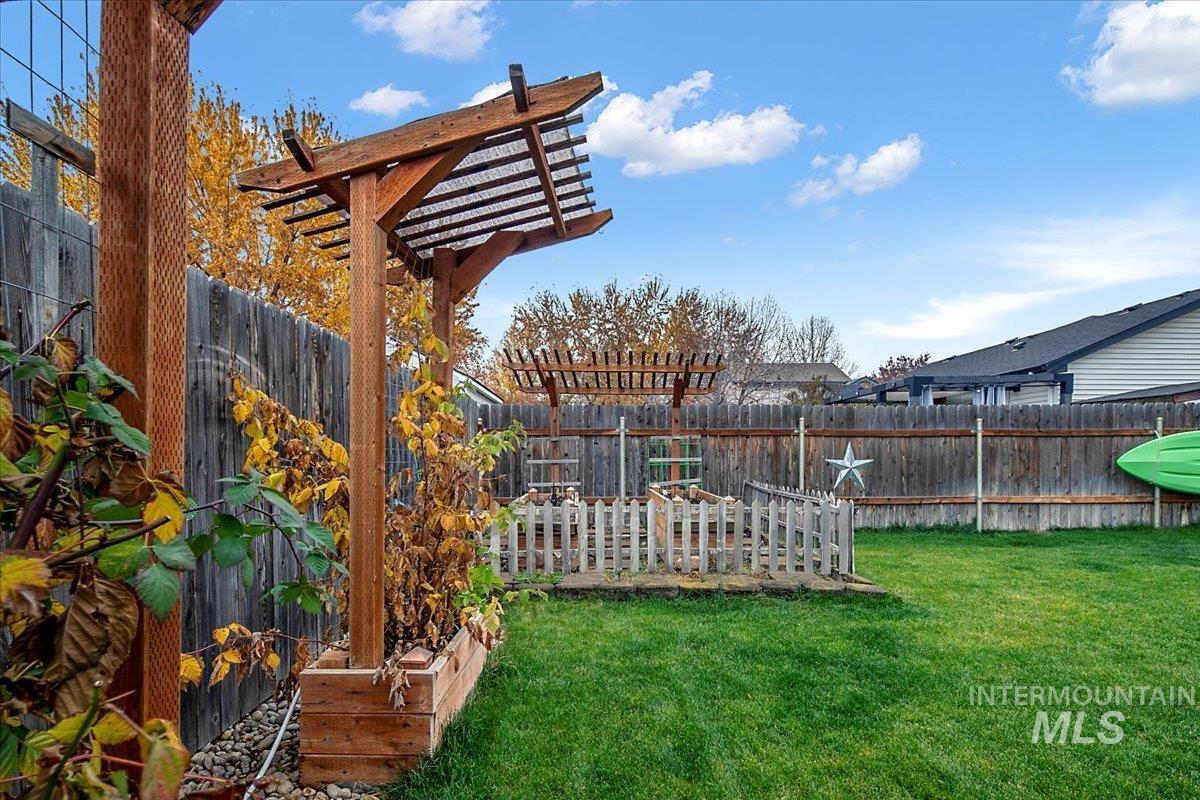 View of fenced backyard
