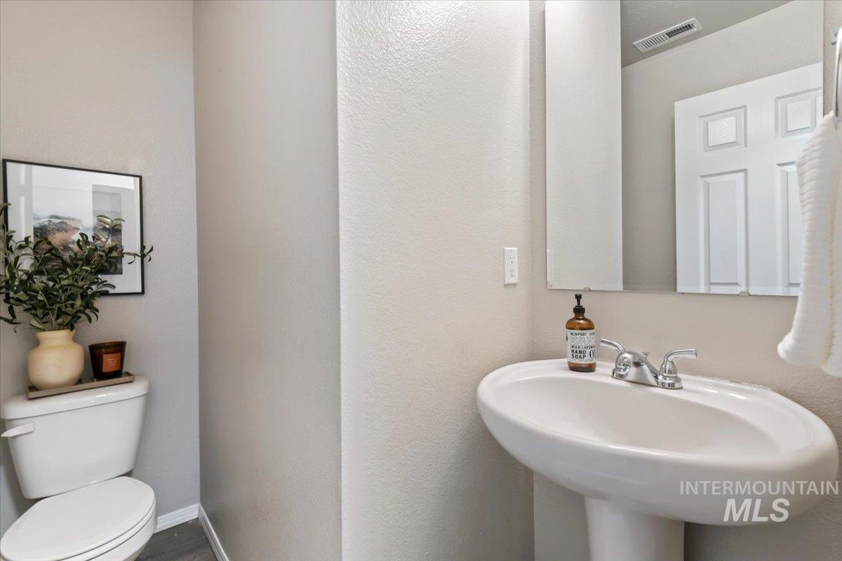 Bathroom featuring a sink and toilet