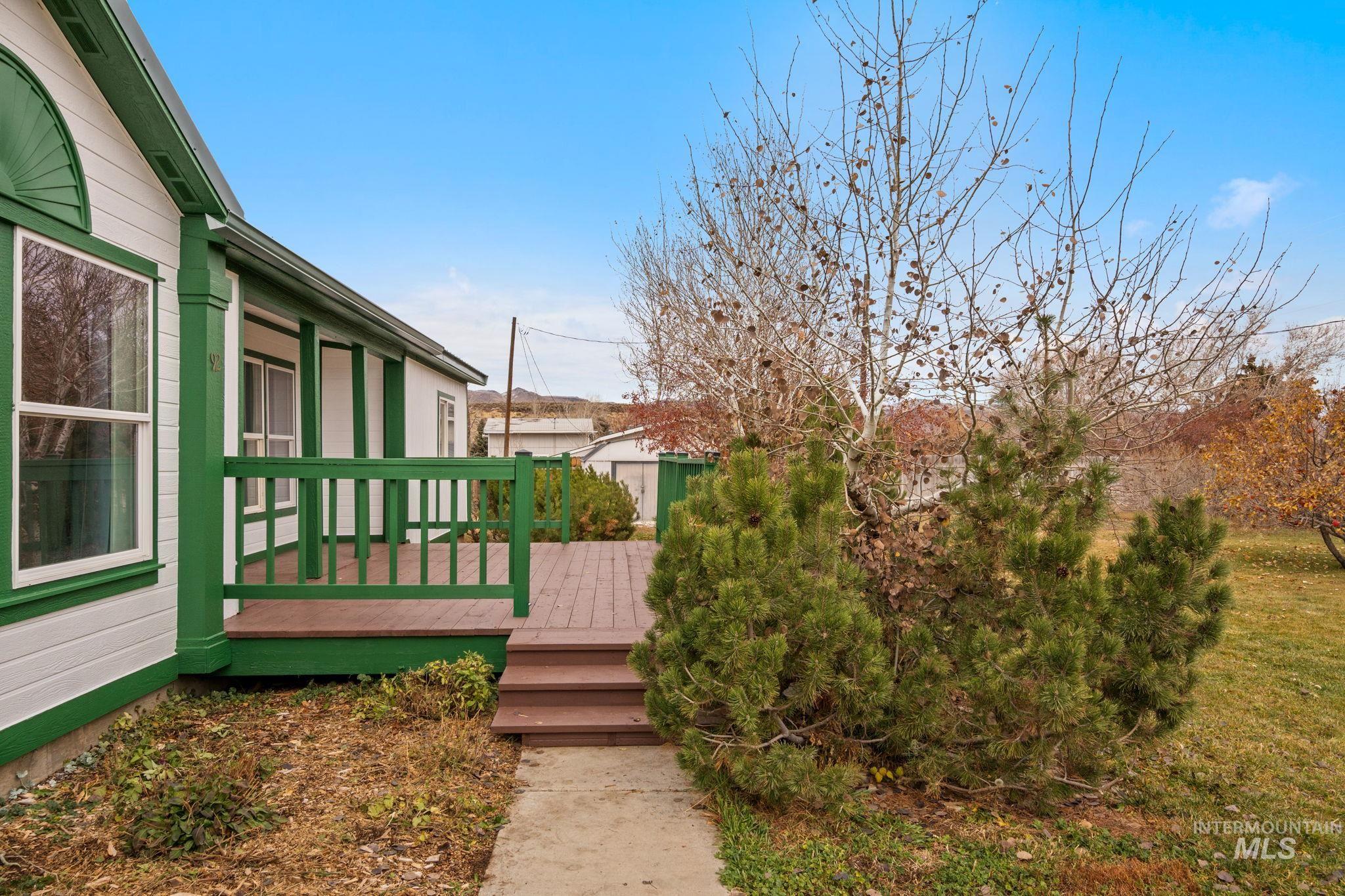 View of yard with a wooden deck