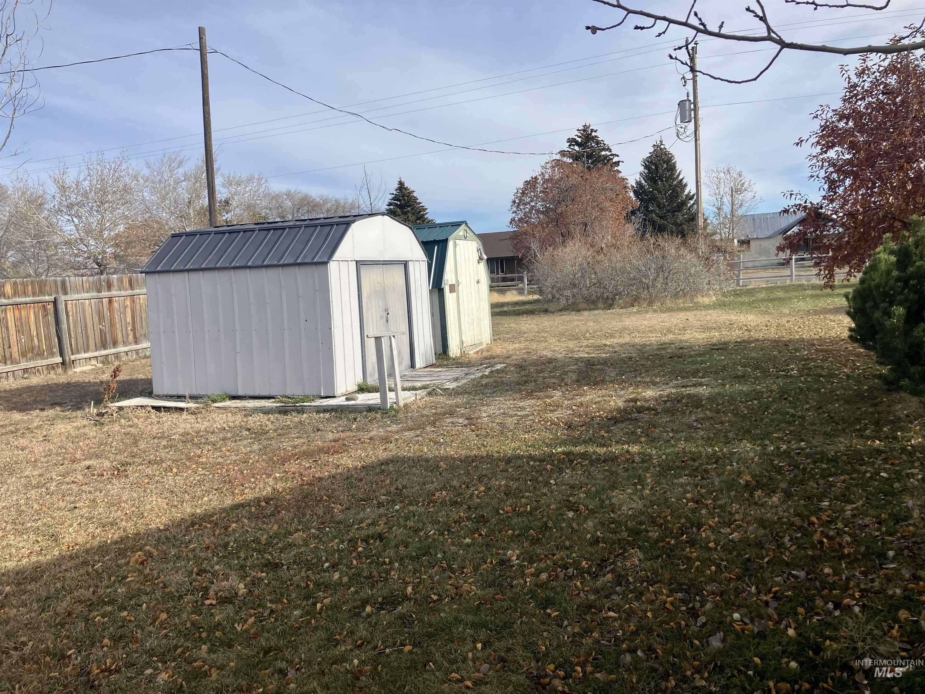 View of shed featuring a fenced backyard