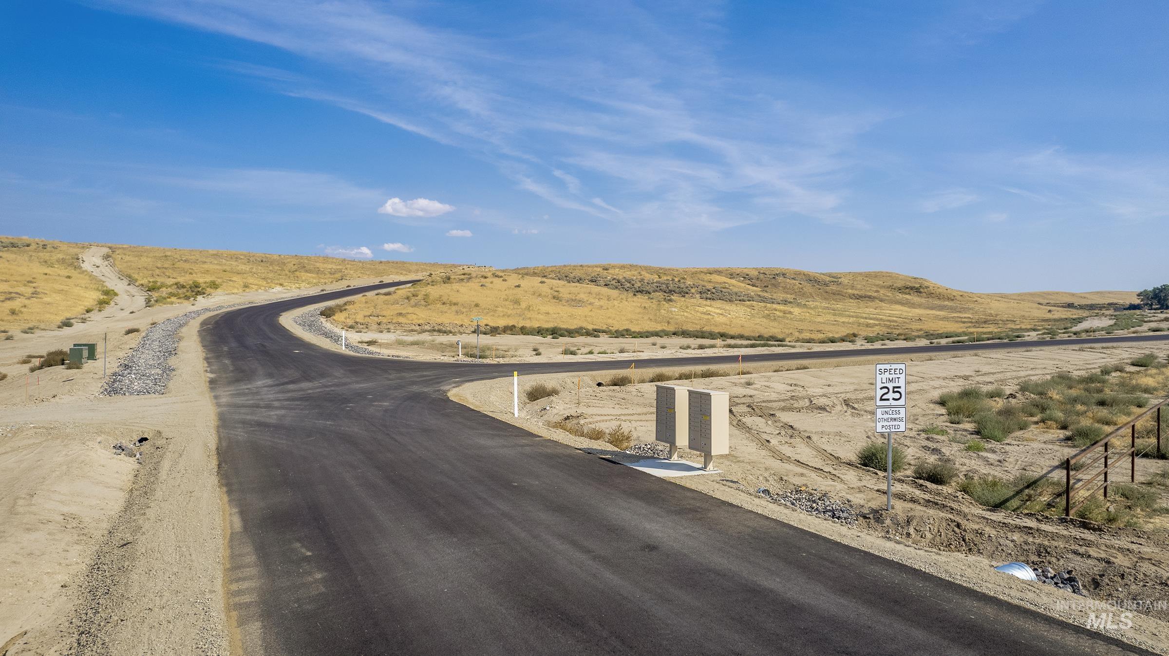 View of asphalt road featuring a mountain view