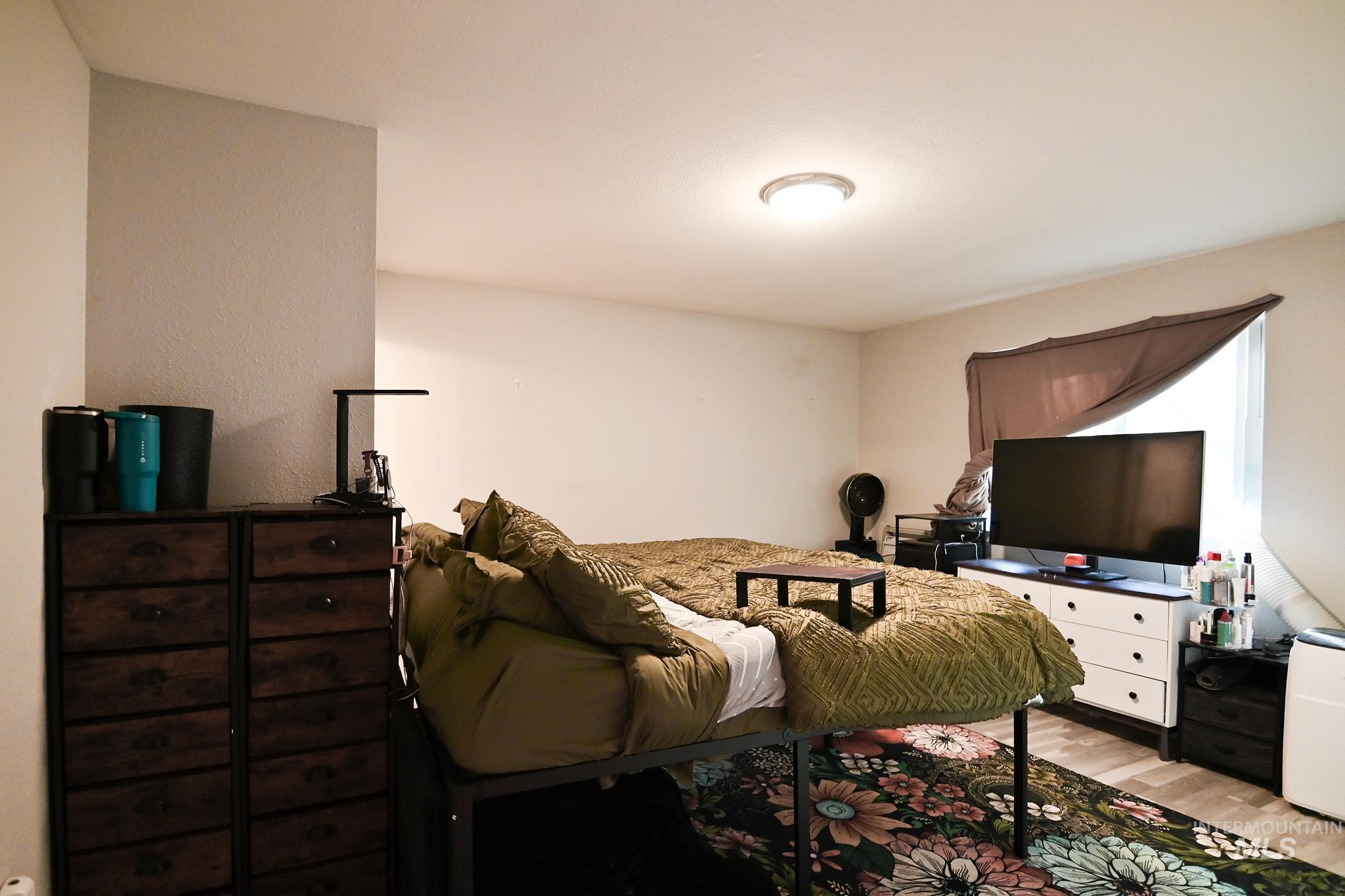 Bedroom featuring light wood finished floors