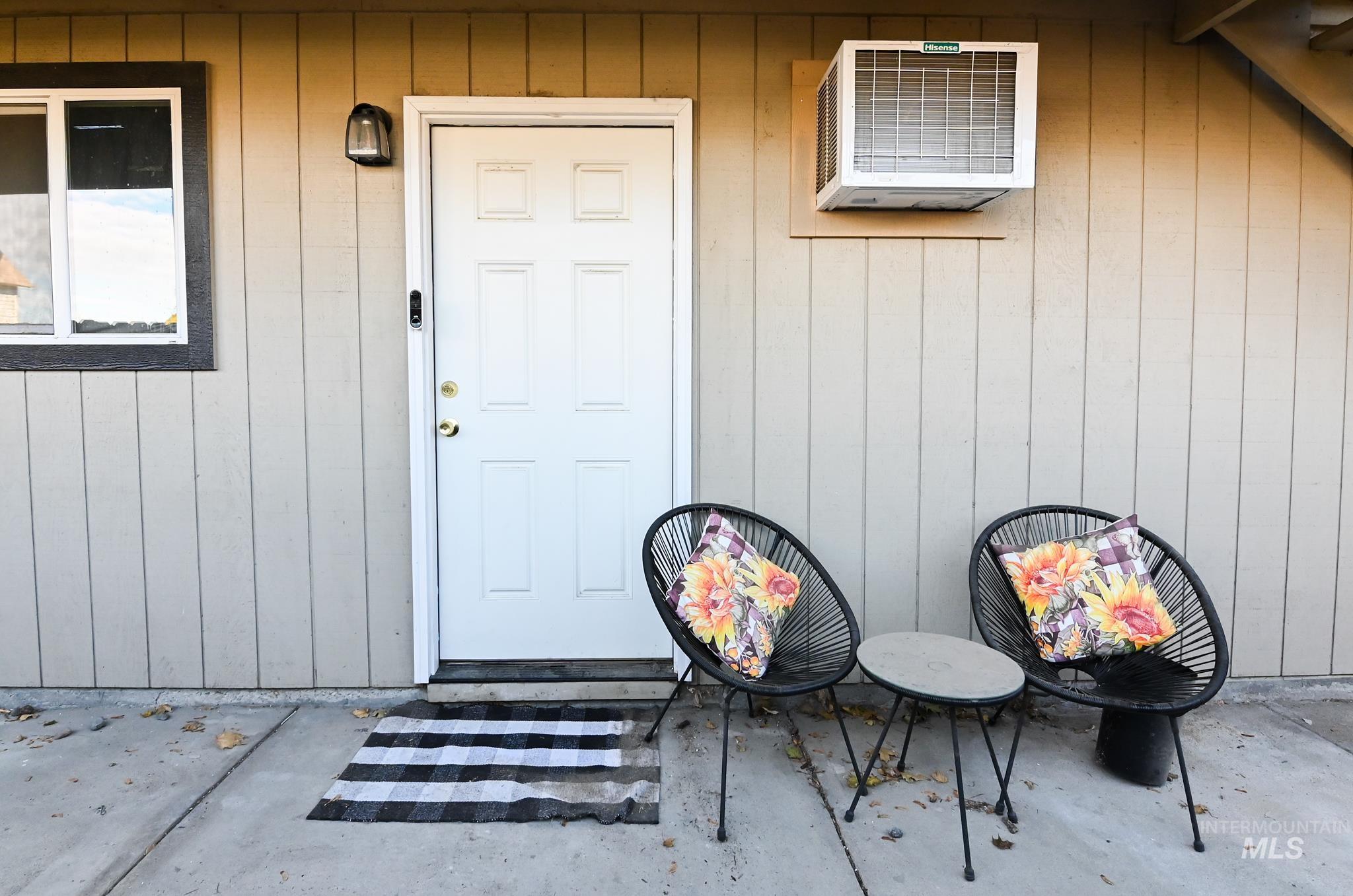 Property entrance with an AC wall unit