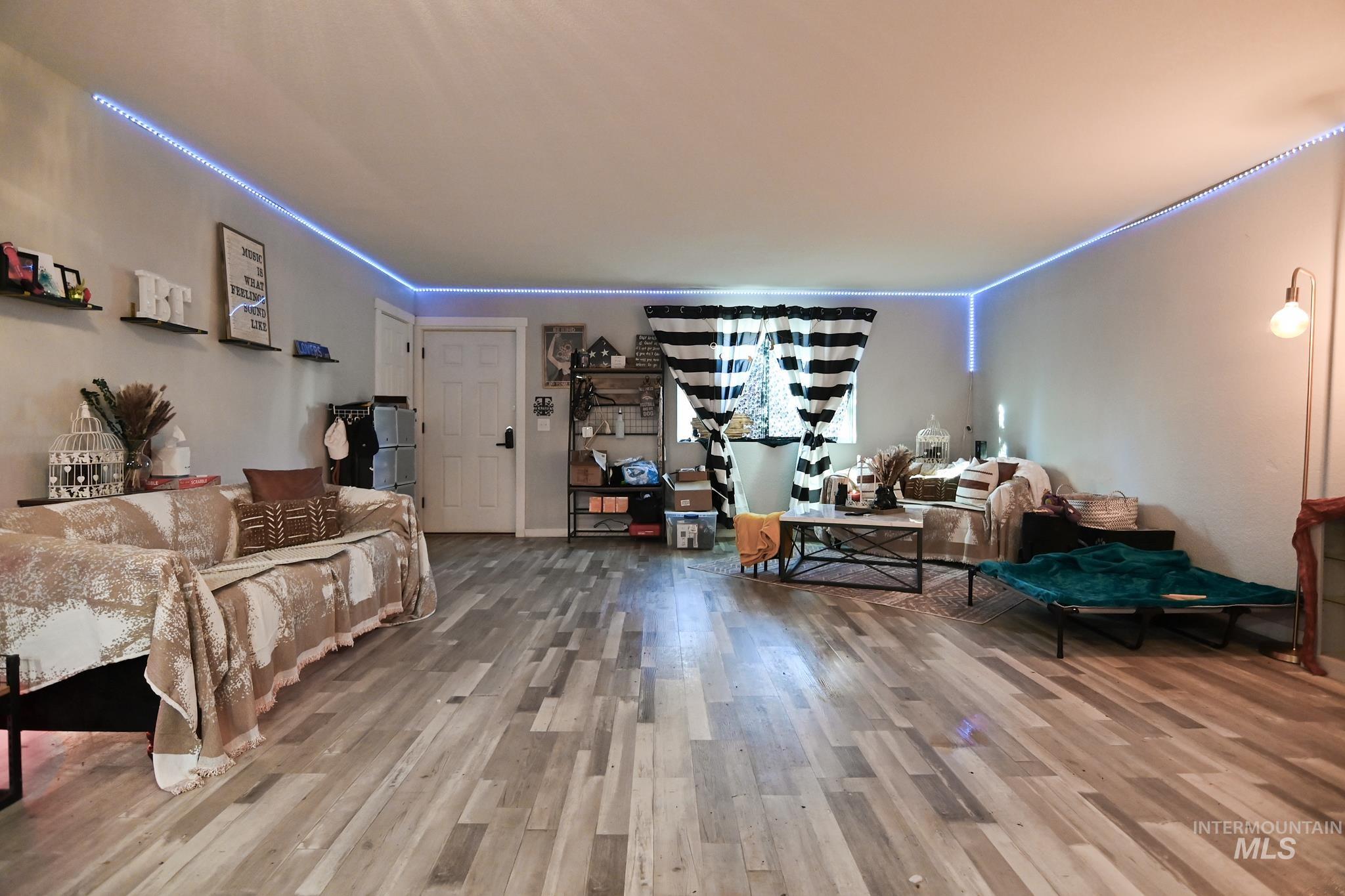 Living room featuring wood finished floors
