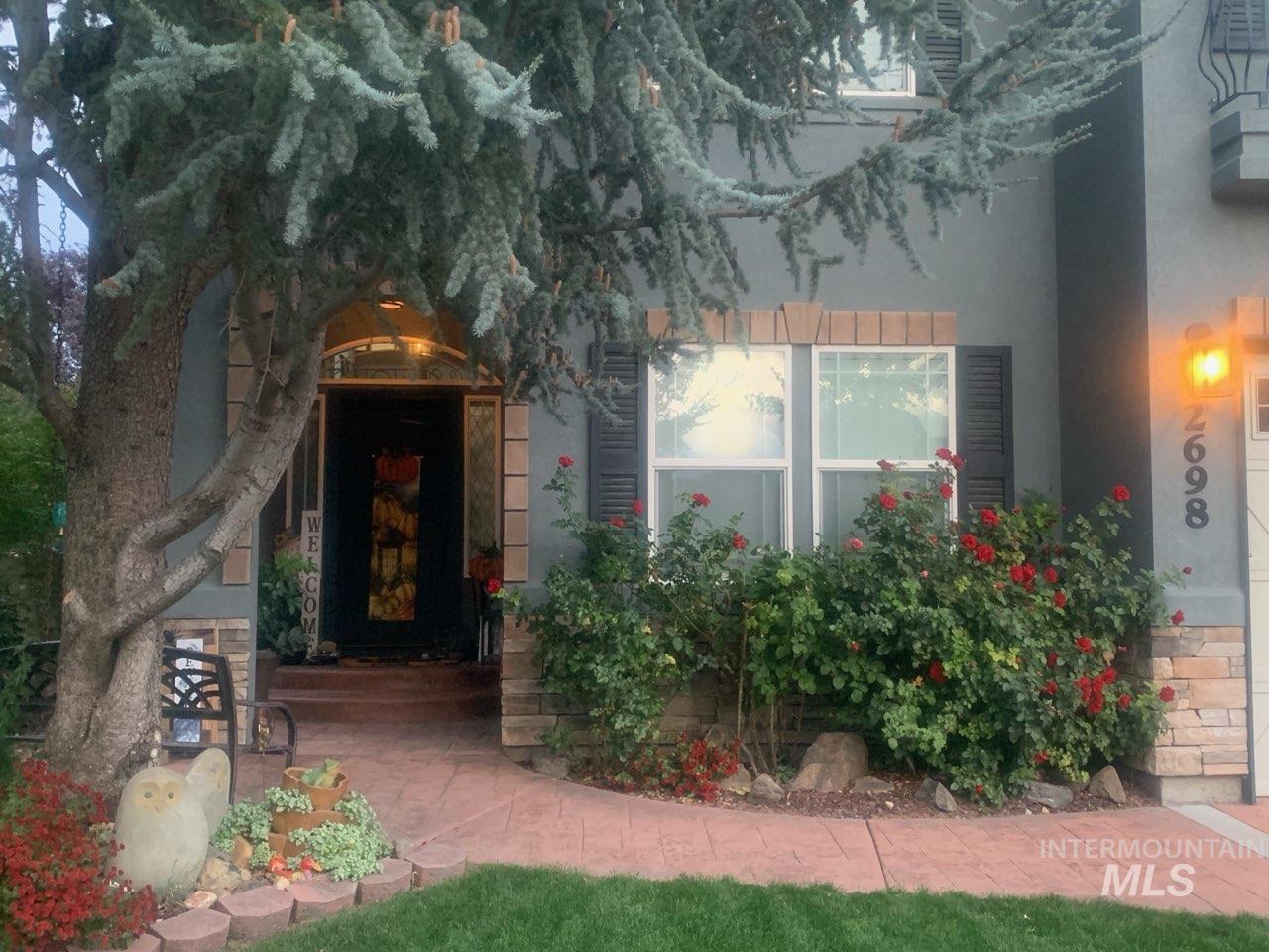Property entrance with stucco siding