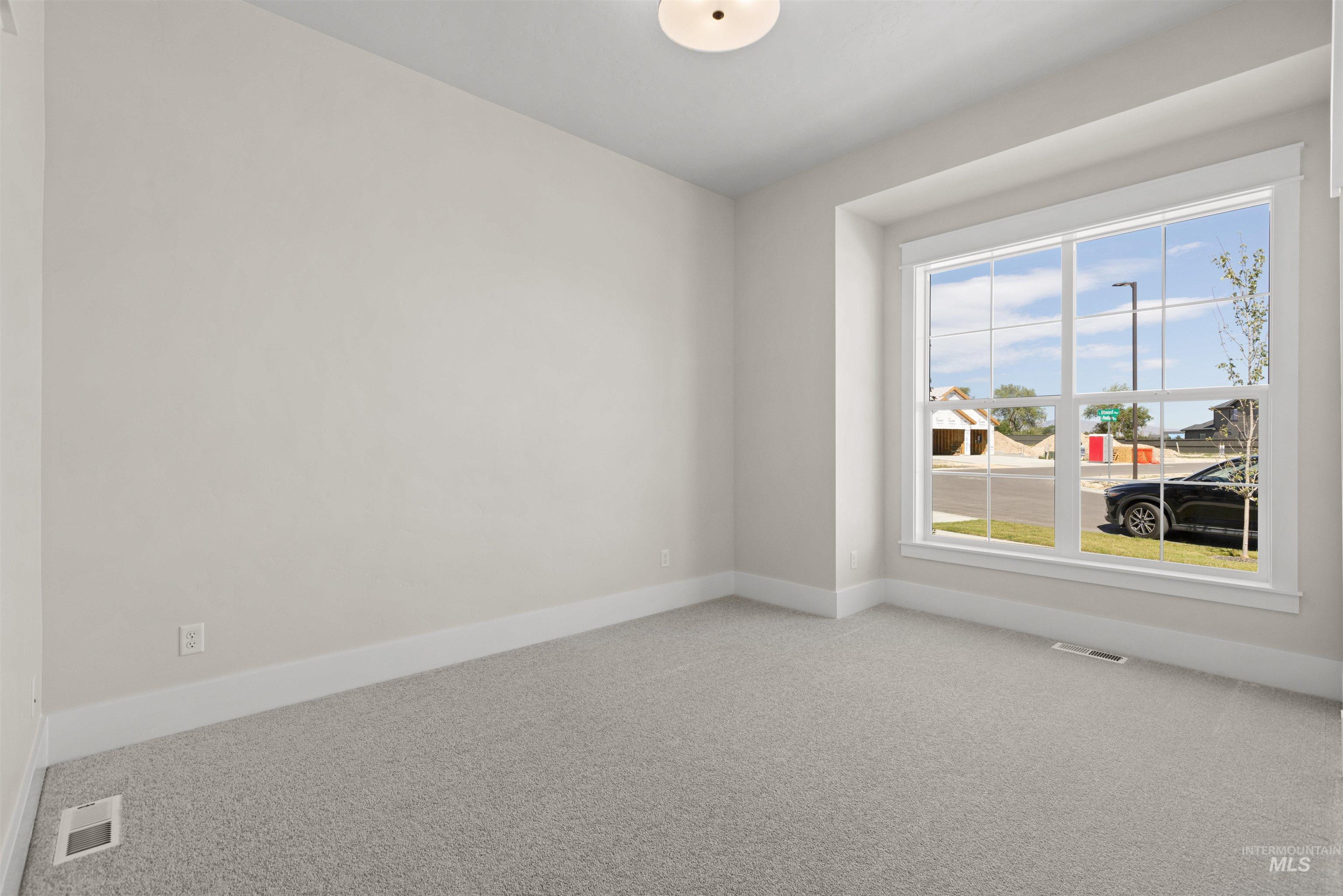 Empty room with baseboards