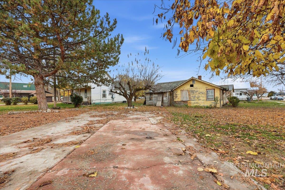 View of front of house featuring a chimney