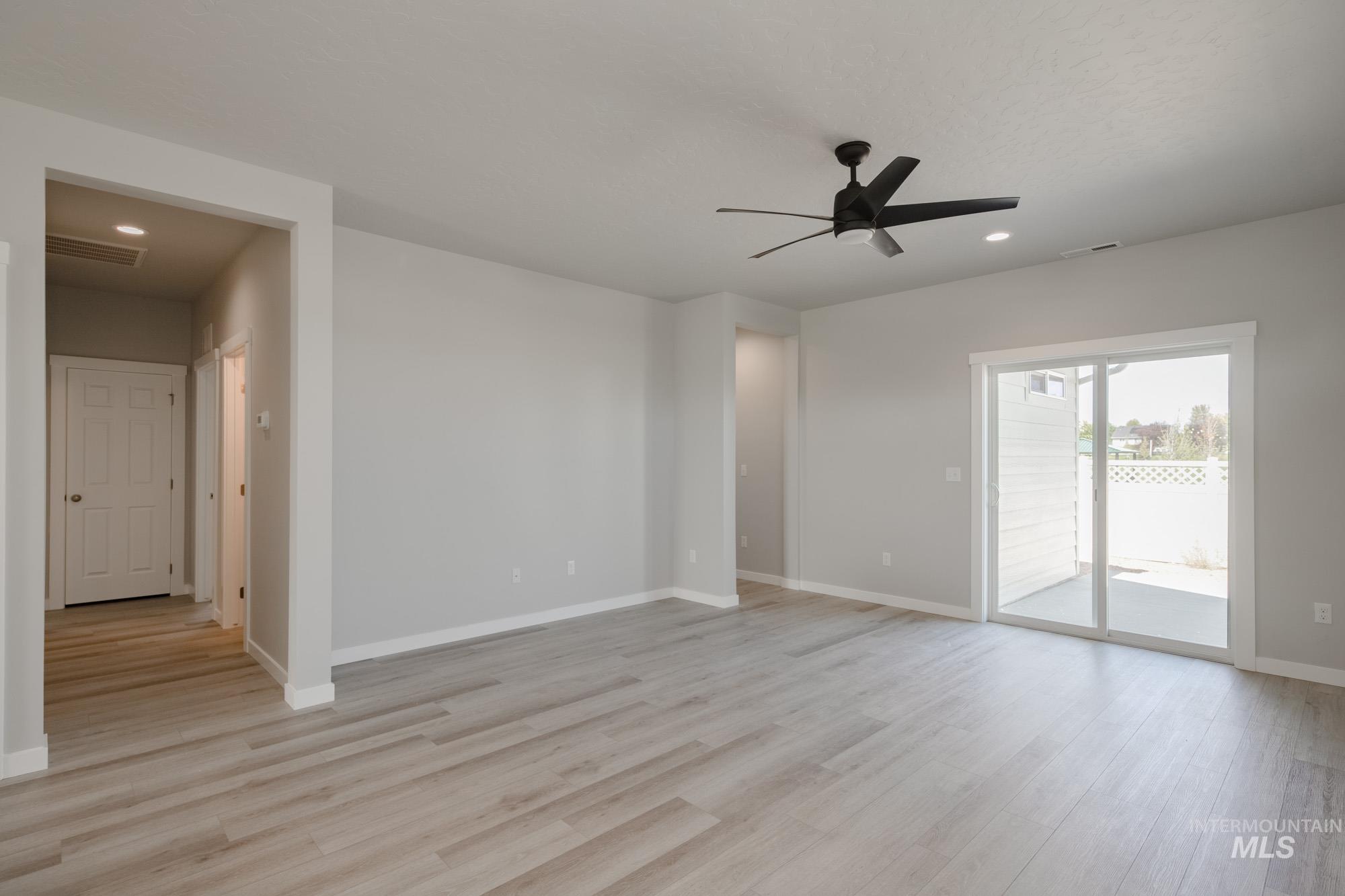 Unfurnished room featuring recessed lighting, light wood-type flooring, and a ceiling fan