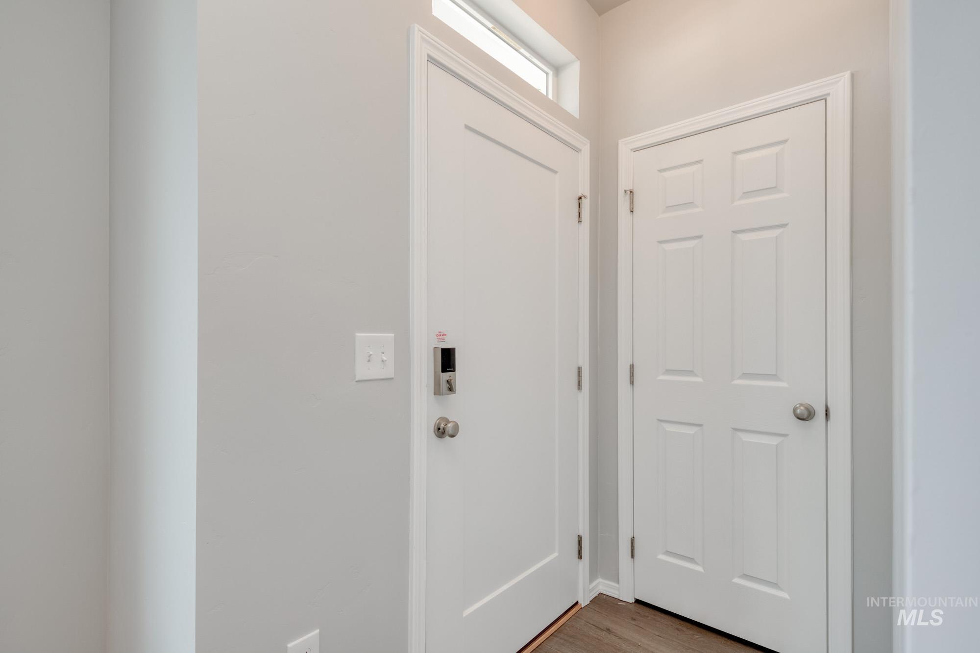 Entrance foyer with light wood finished floors