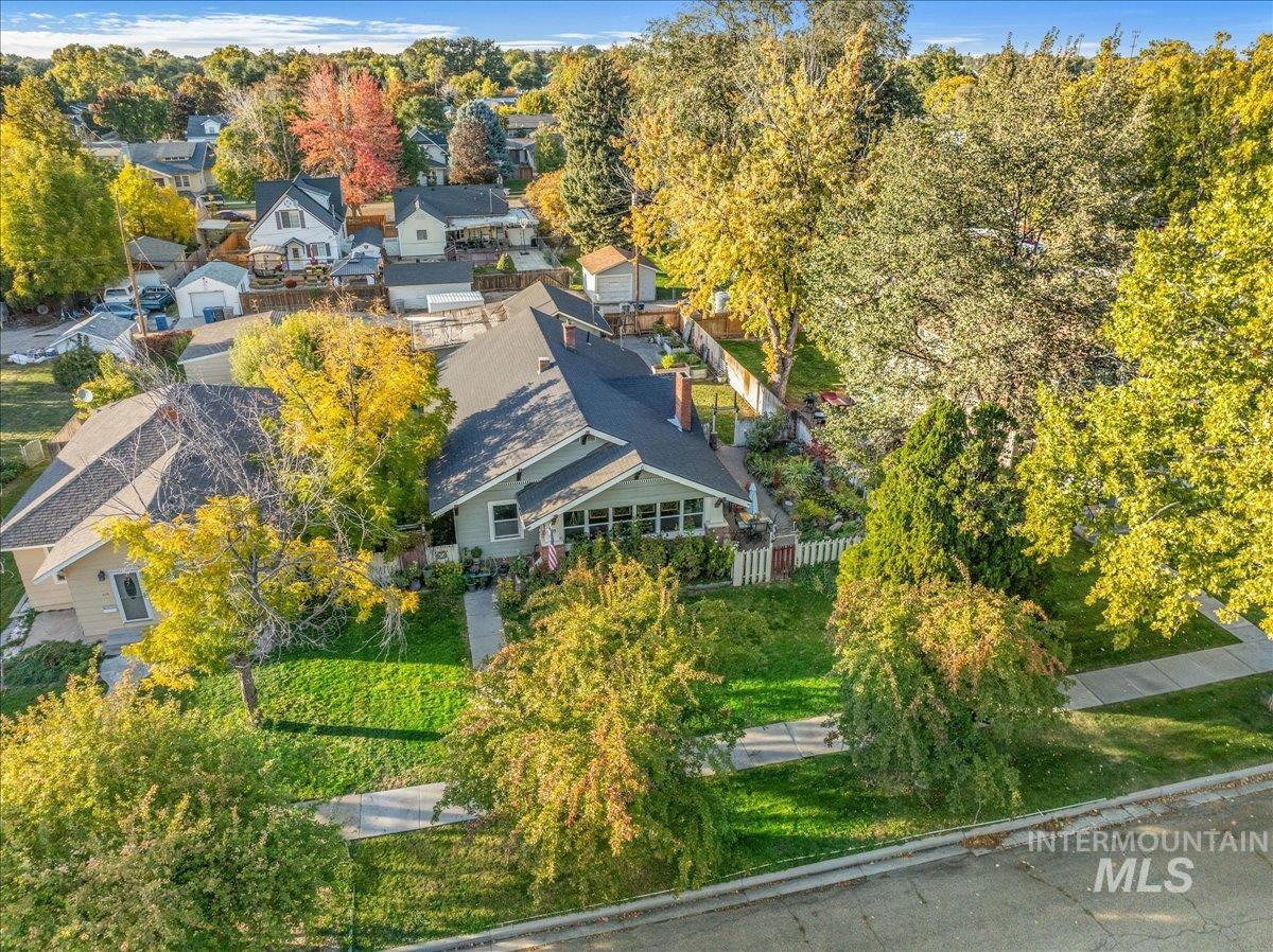 Aerial overview of property's location featuring nearby suburban area