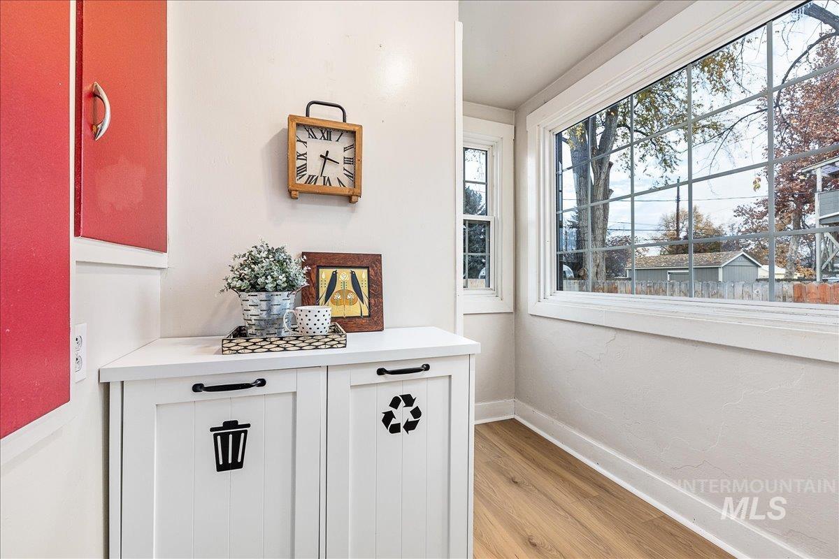 Detailed view of baseboards and wood finished floors