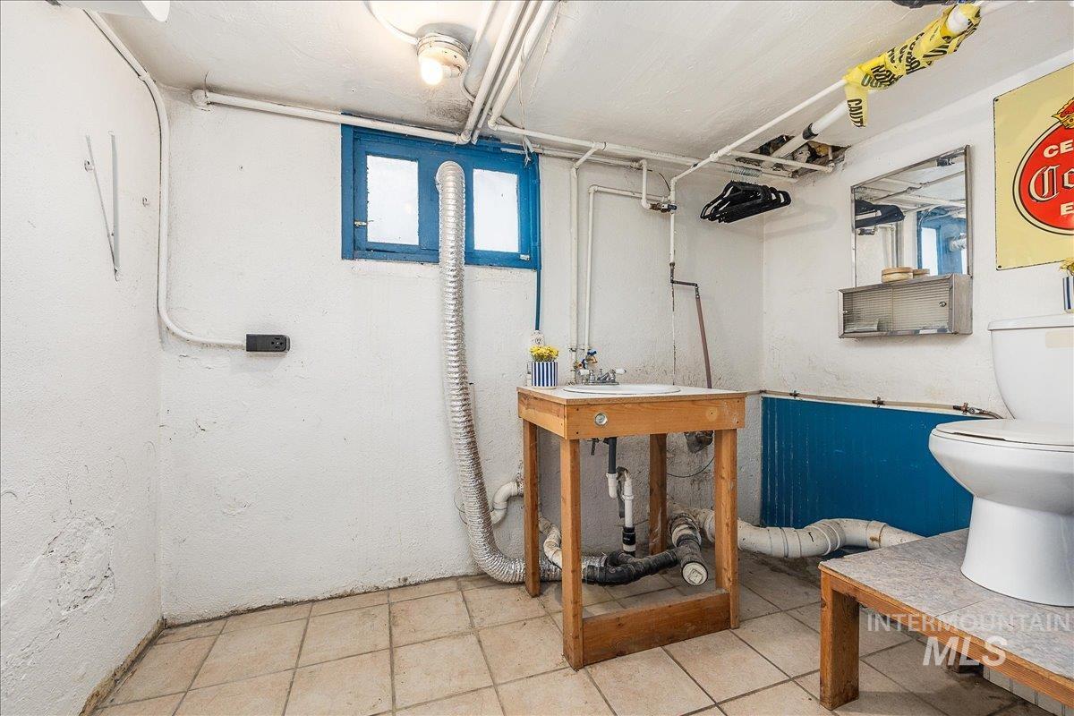 Full bath featuring plenty of natural light and a shower