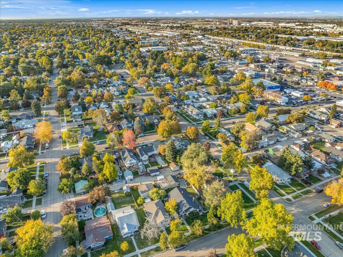 View of property location with nearby suburban area