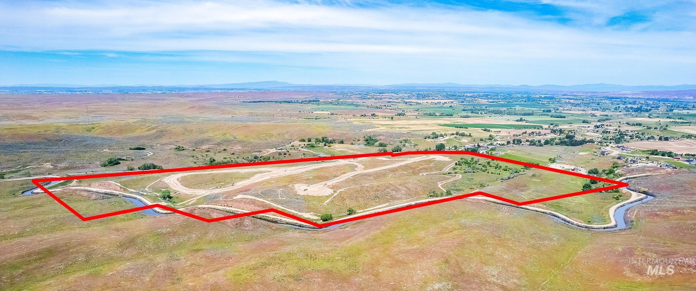 View of property location featuring property parcel outlined and a mountainous background