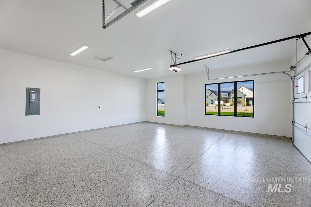 Garage featuring electric panel