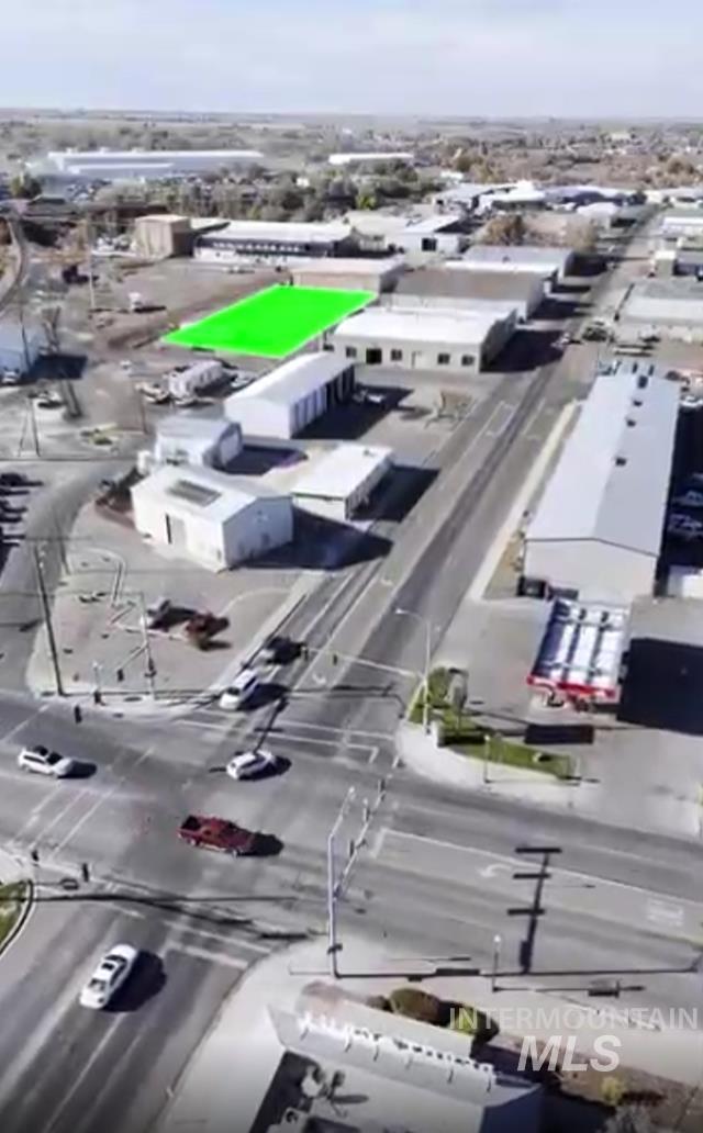 View of property location featuring industrial structures