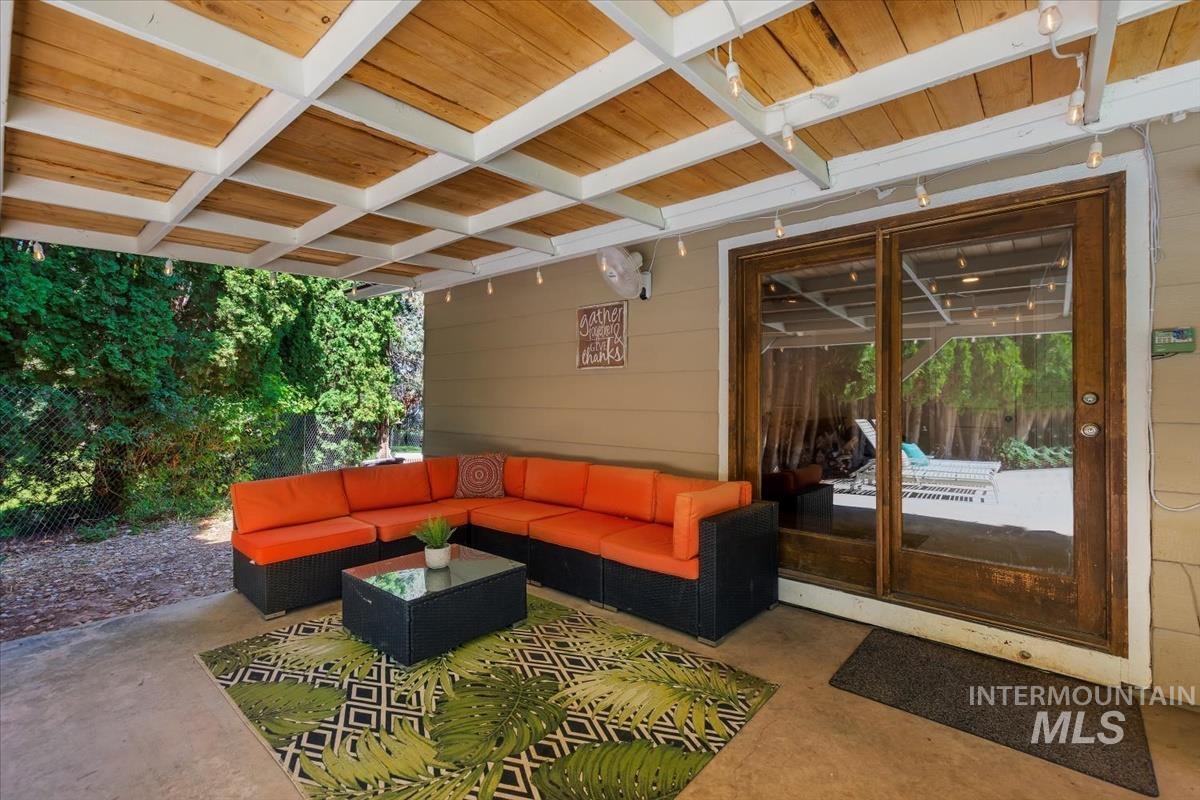 Building lobby with wood walls and a wood ceiling with exposed beams