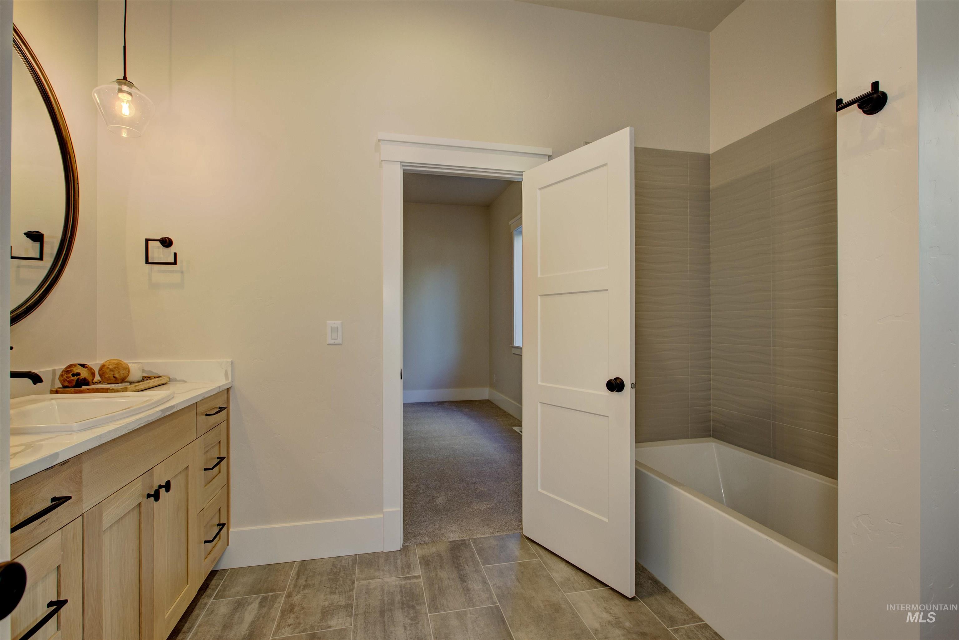 Full bathroom with vanity and shower / bath combination