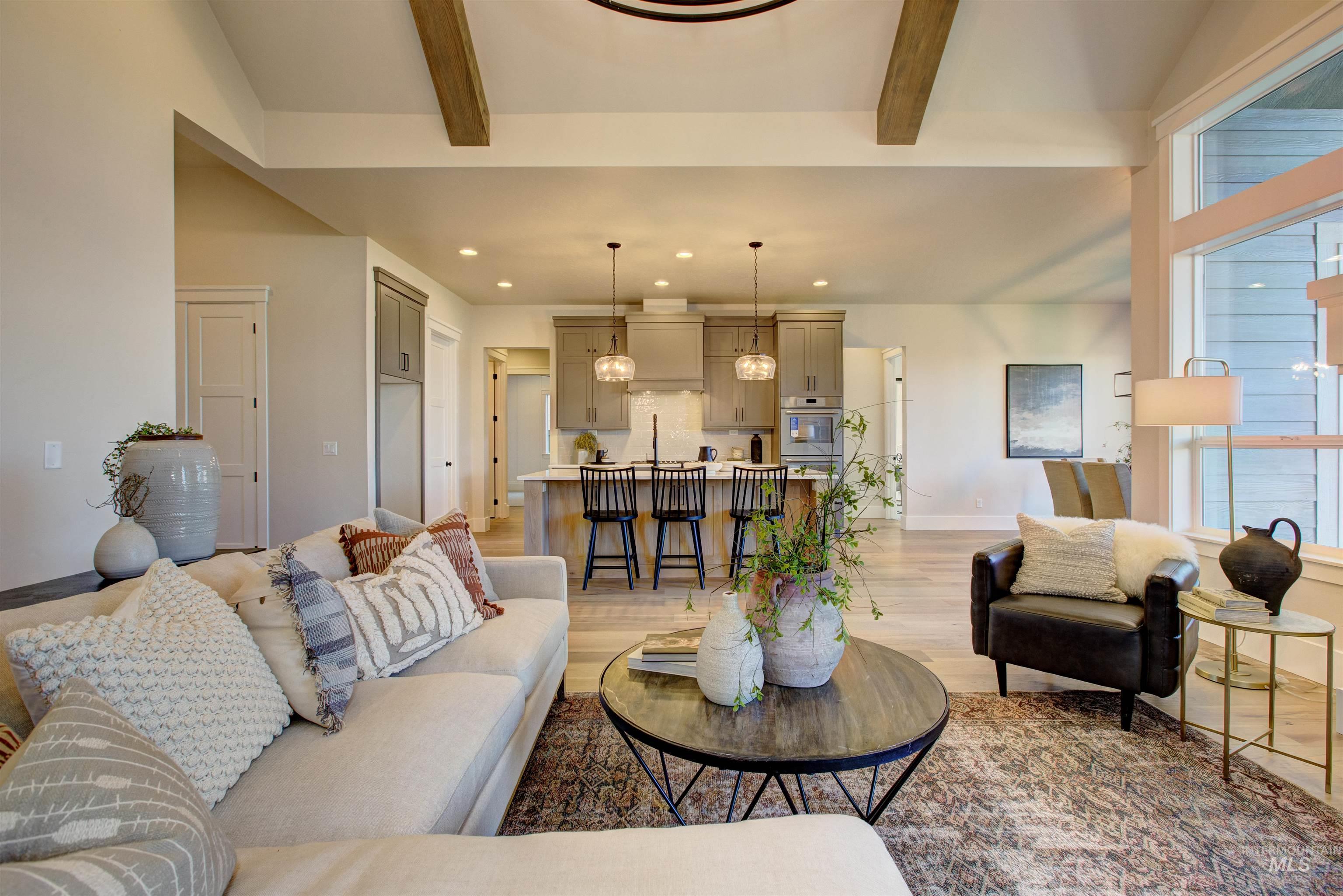 Living room featuring light wood-style floors and recessed lighting