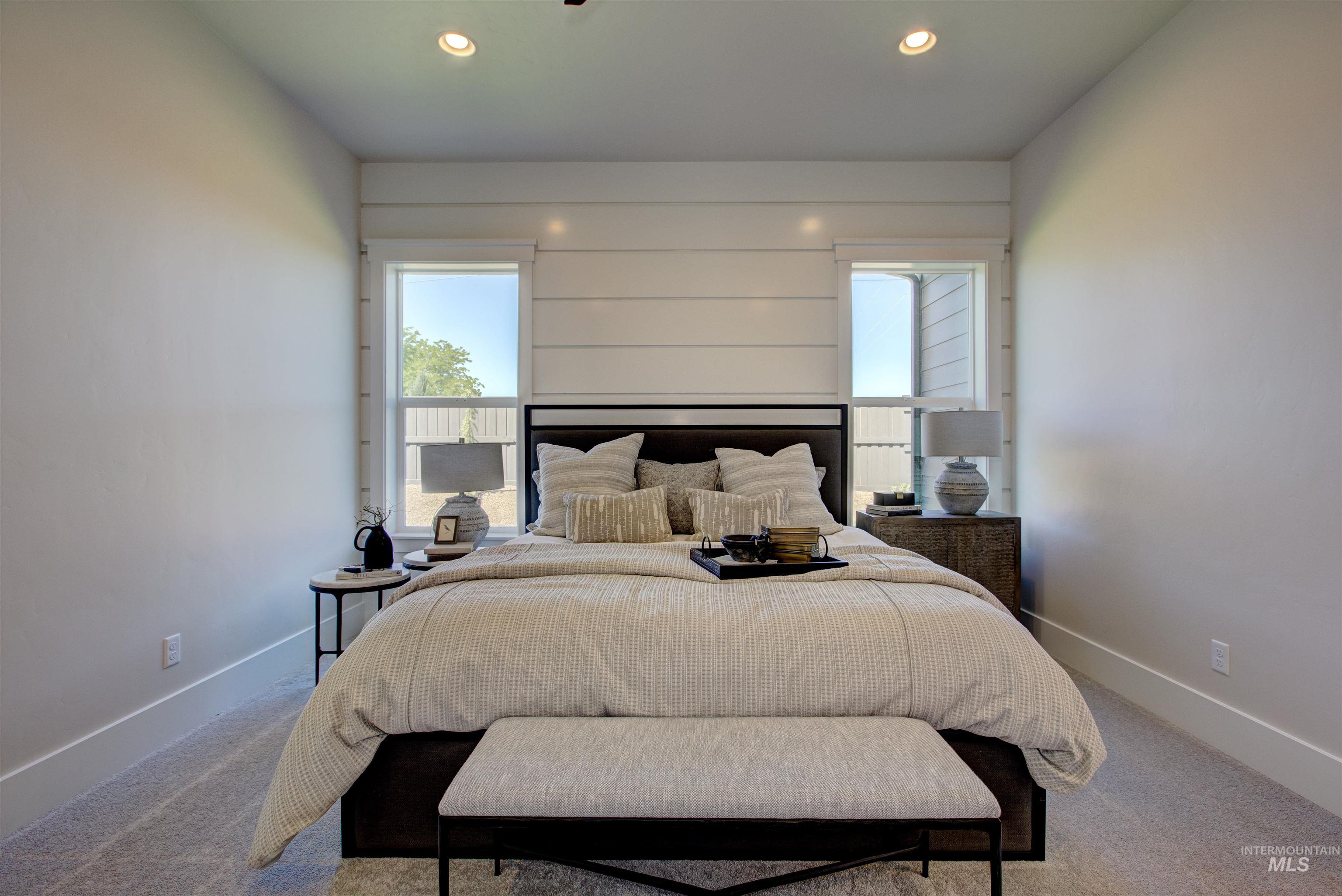 Bedroom with carpet floors and recessed lighting