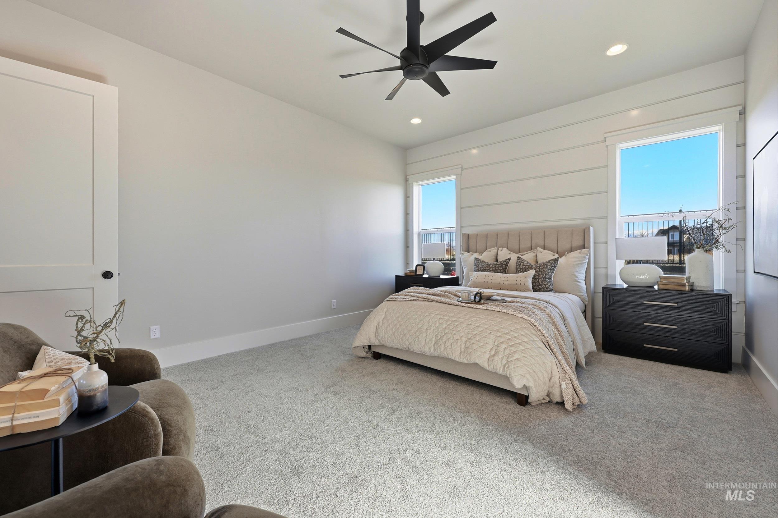 Bedroom with carpet flooring, a ceiling fan, and recessed lighting