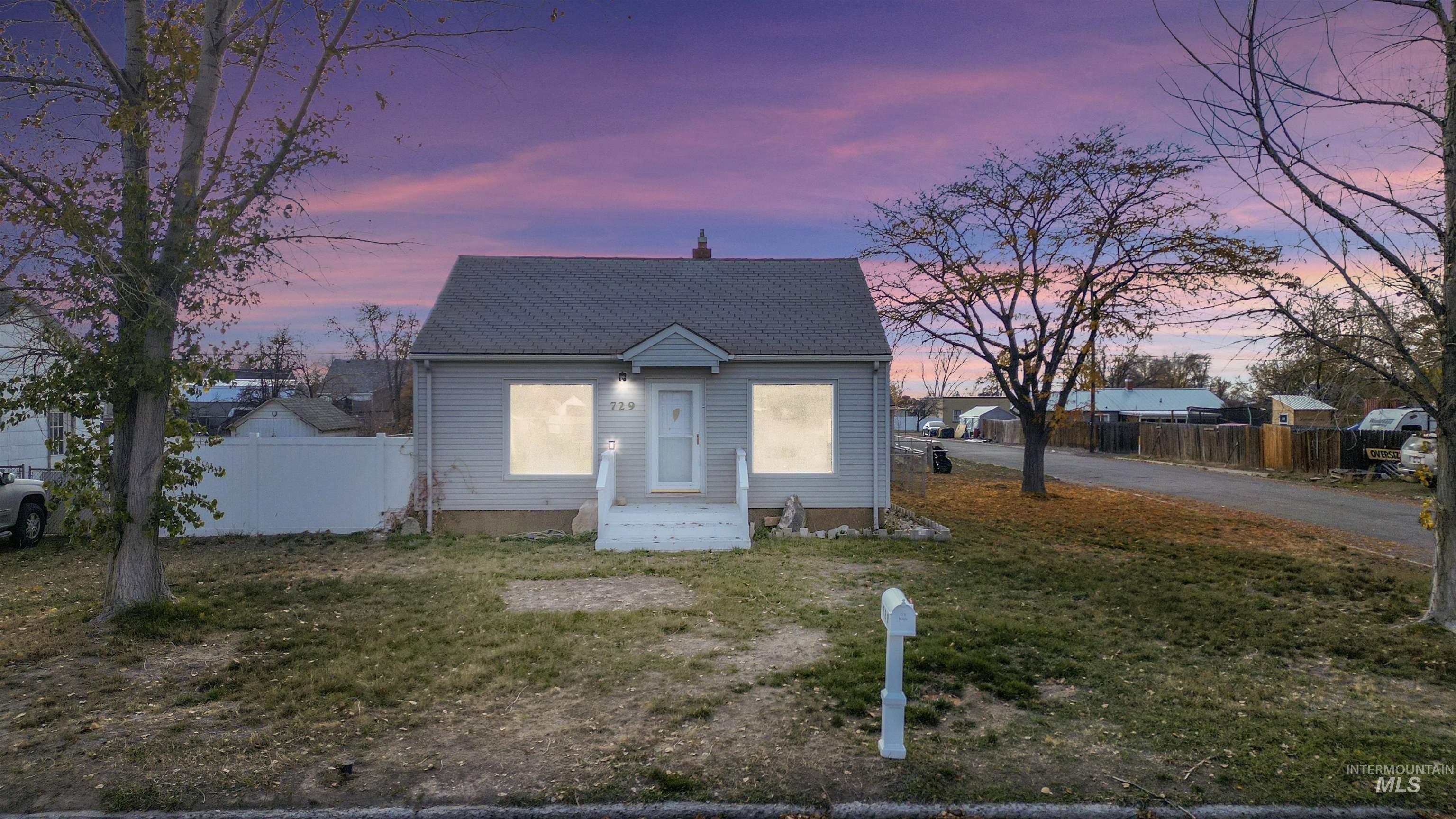 View of front of home with a chimney