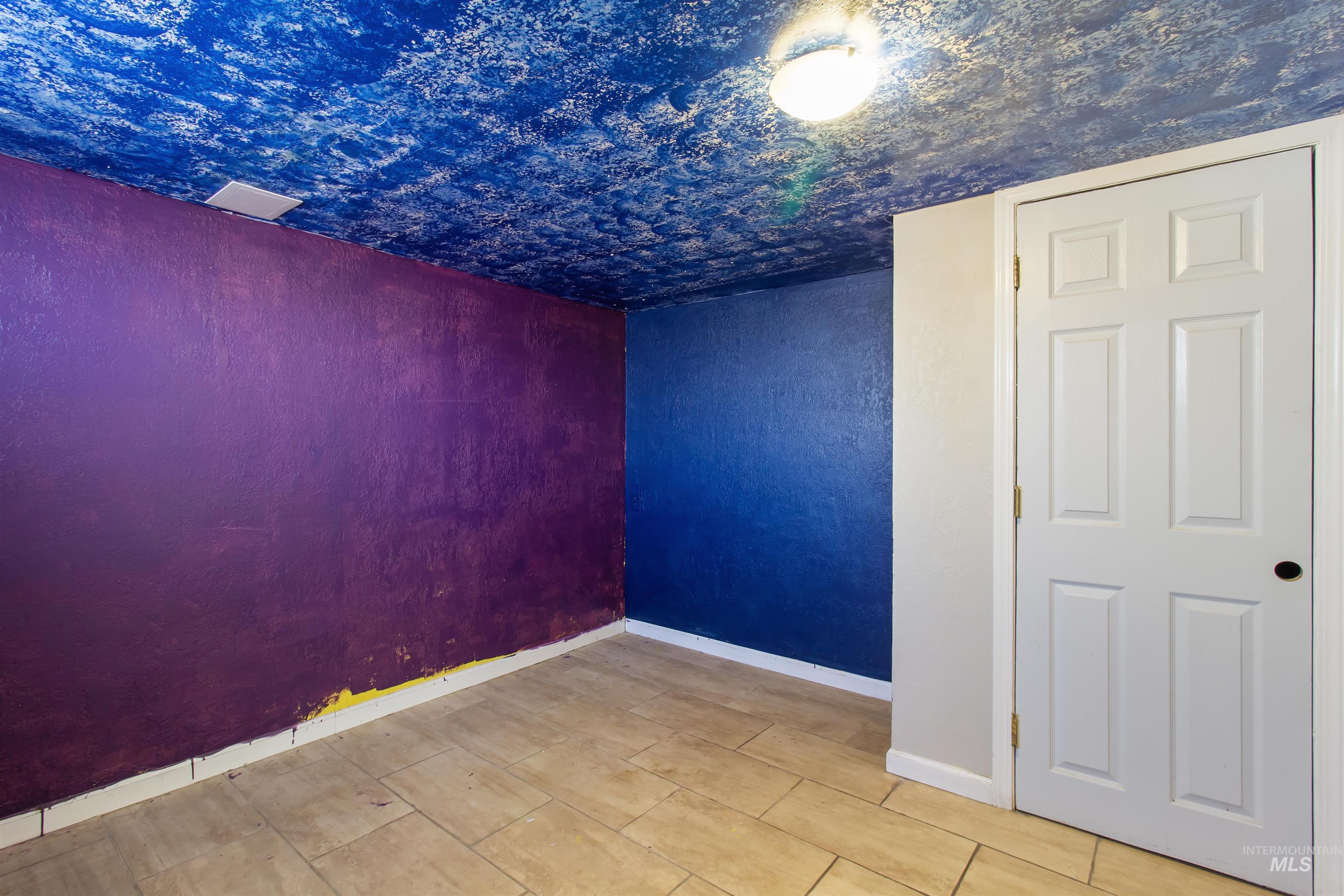 Spare room with baseboards