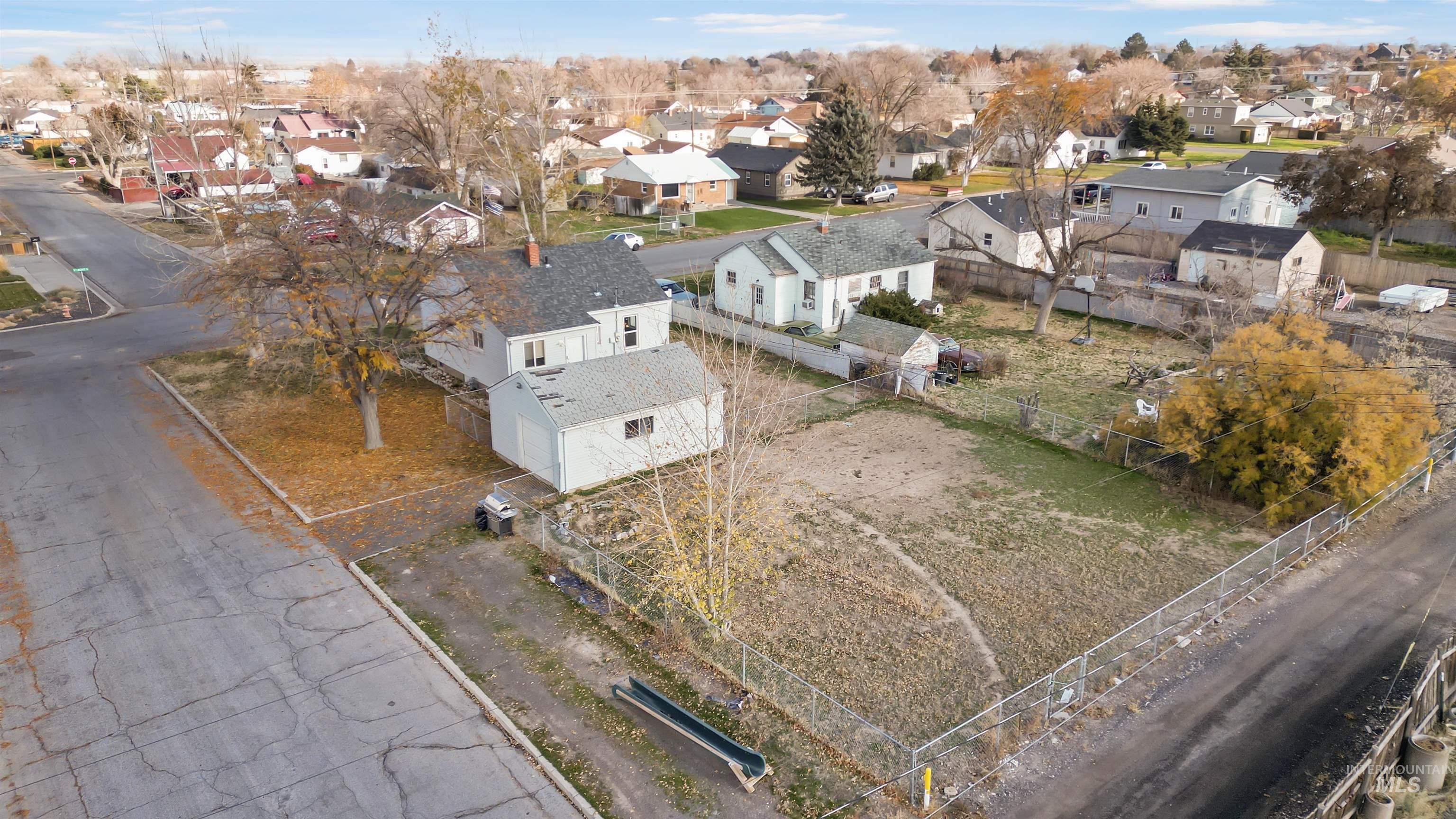 Aerial overview of property's location with nearby suburban area