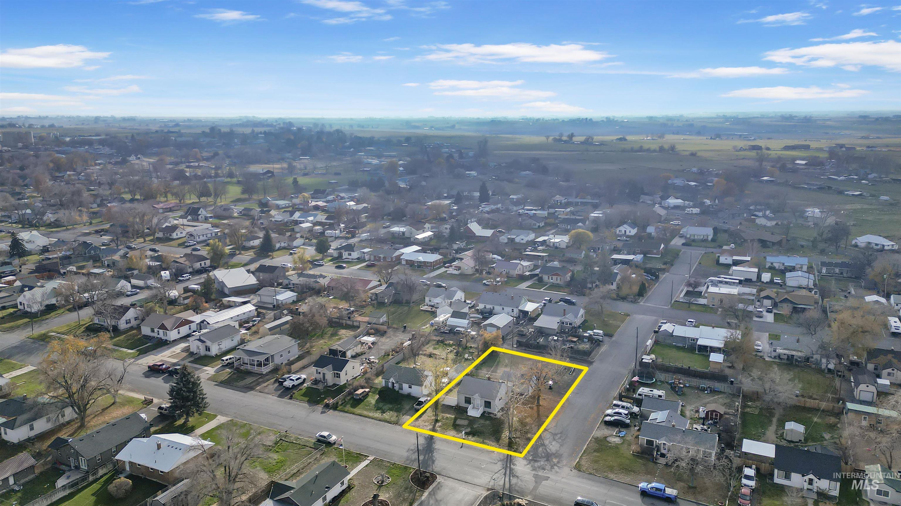 Aerial perspective of suburban area with property boundaries highlighted