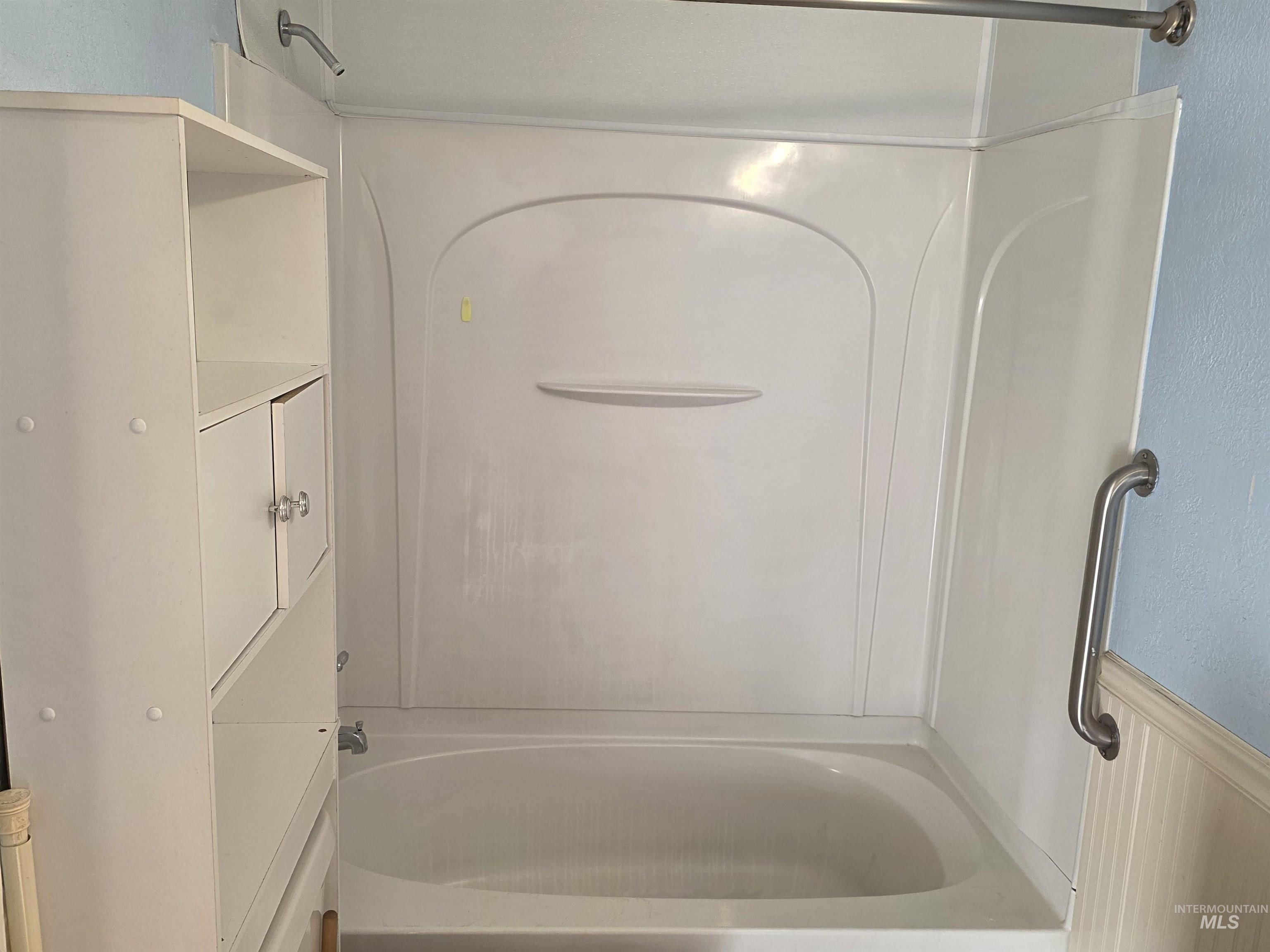 Full bathroom featuring tub / shower combination