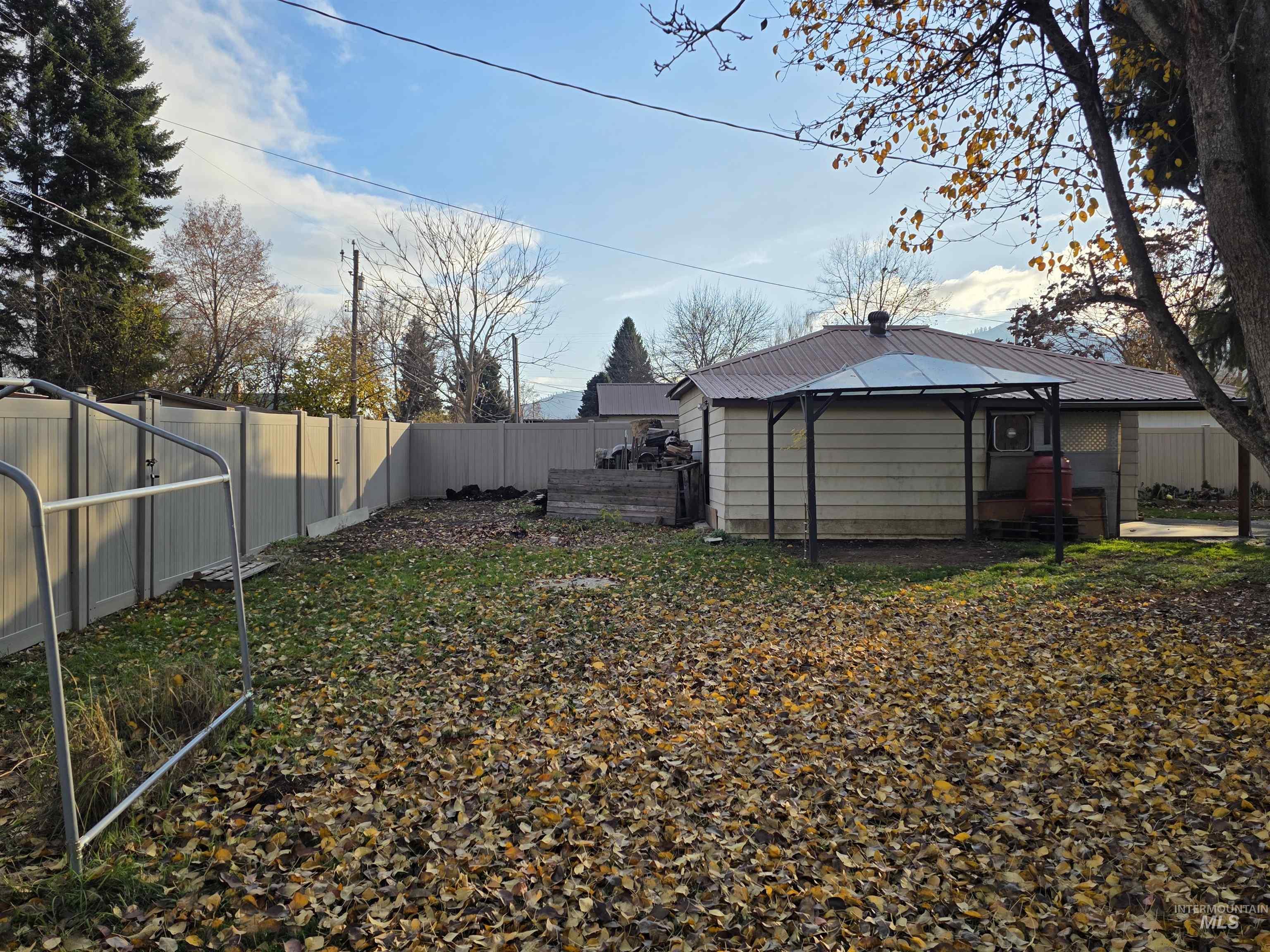 View of fenced backyard