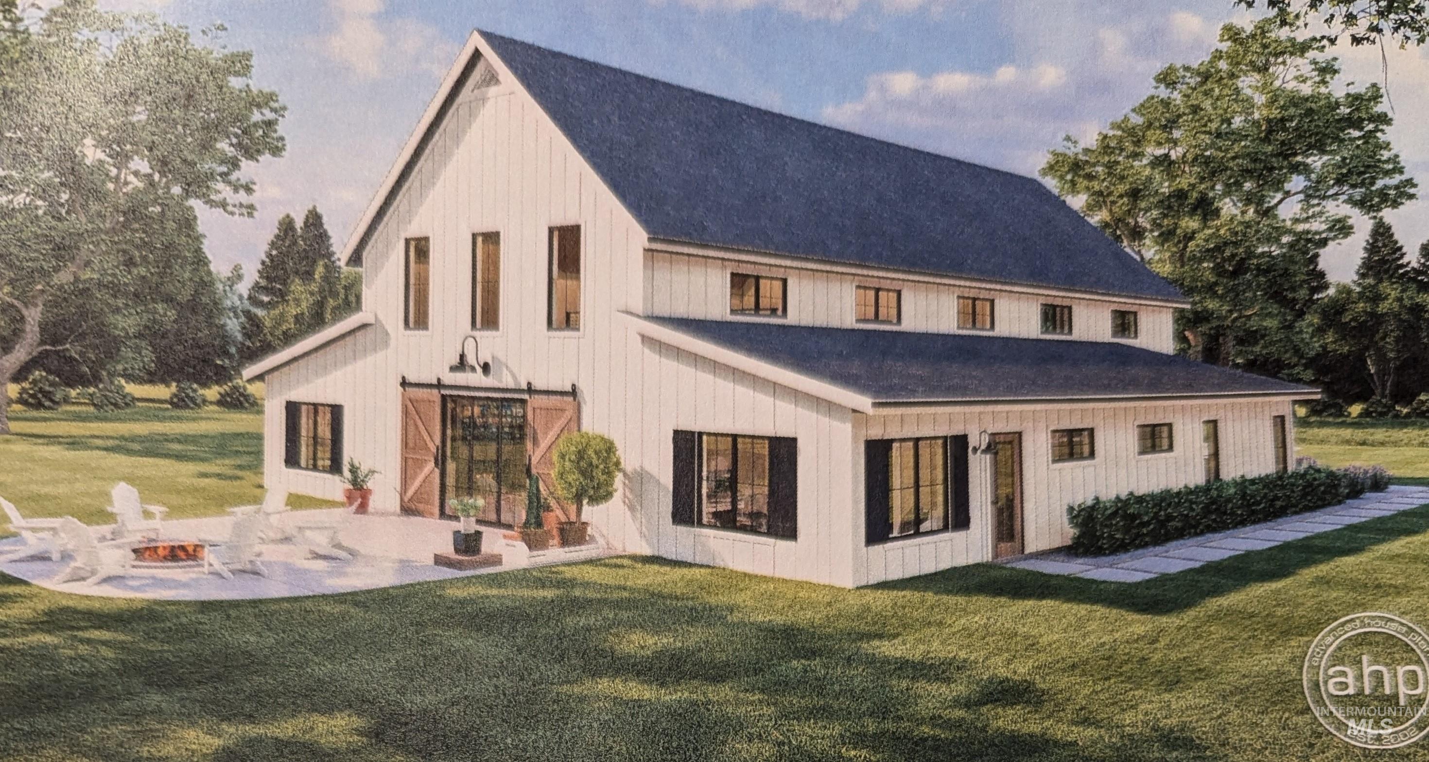 front of house featuring a yard and an outdoor fire pit