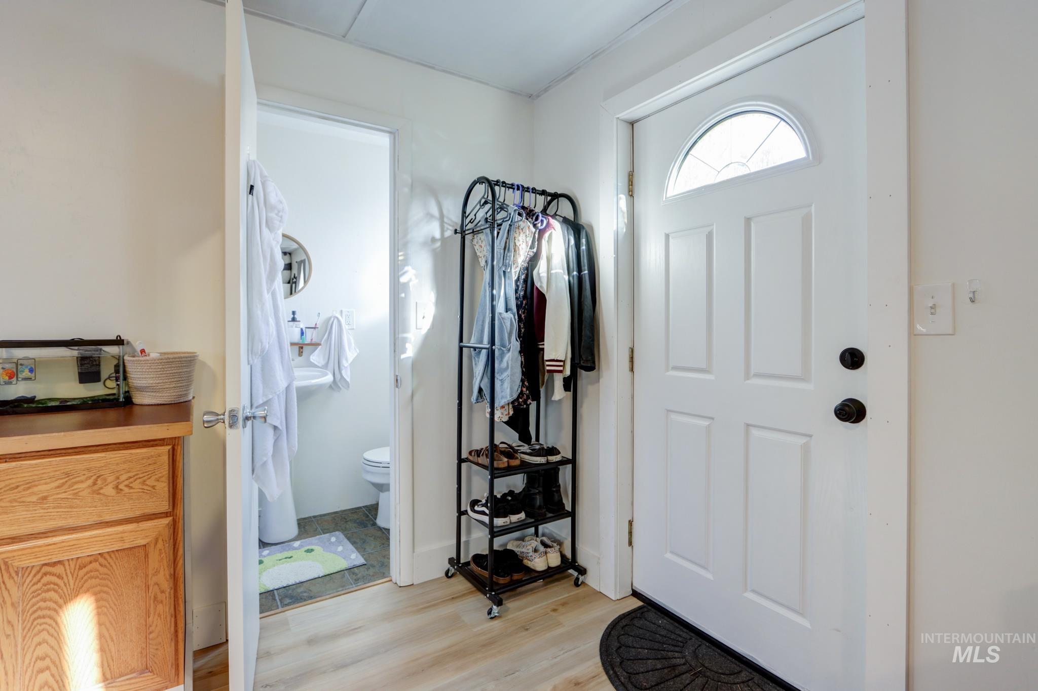 Foyer entrance featuring light wood-style flooring