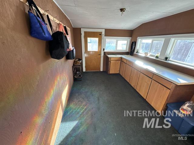 Room off kitchen used for hobby/mud room