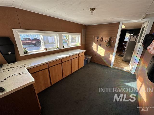 Extra room off kitchen to outside.