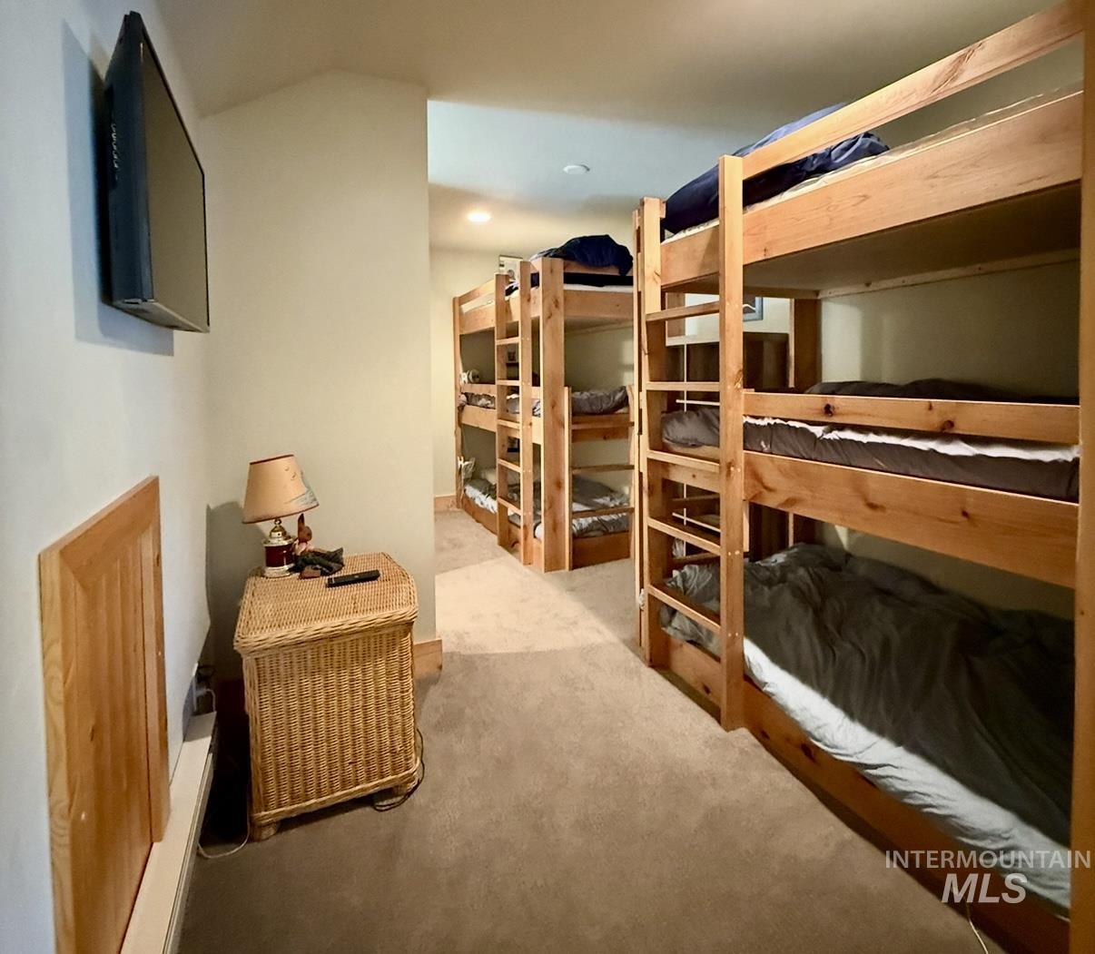 Bedroom featuring light carpet and recessed lighting