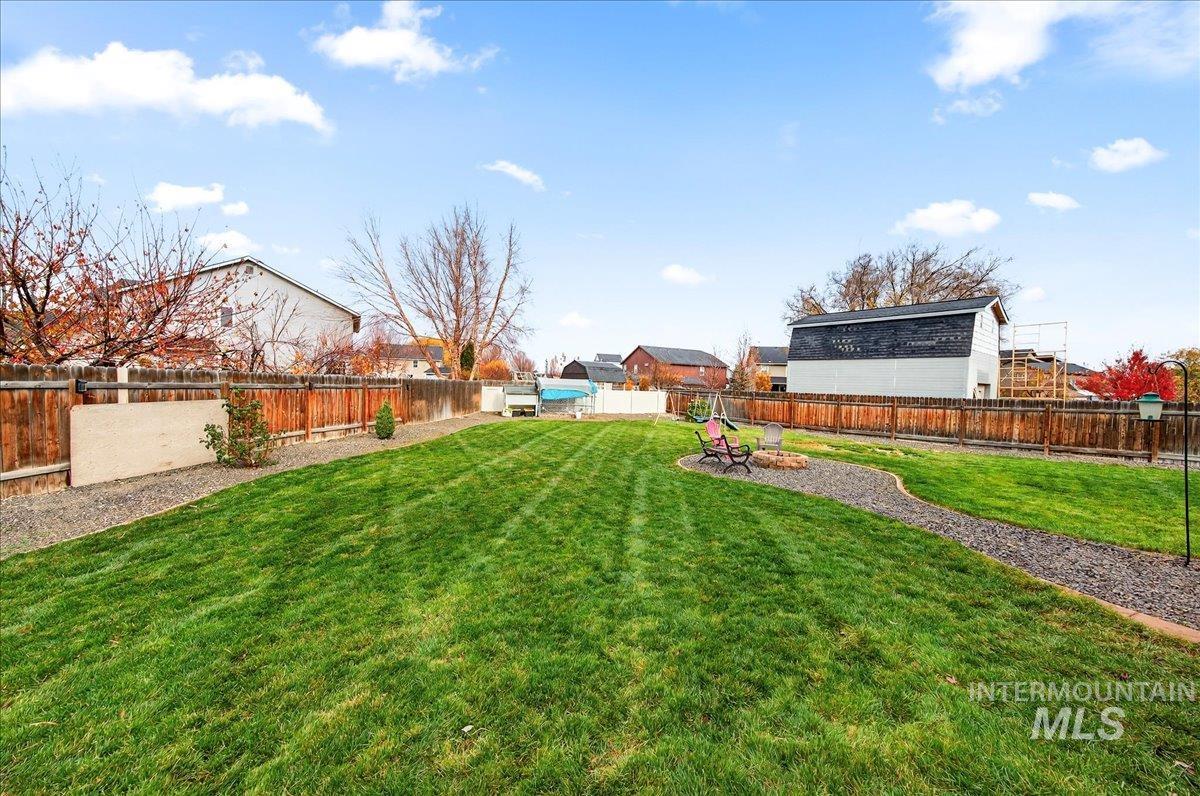 View of fenced backyard