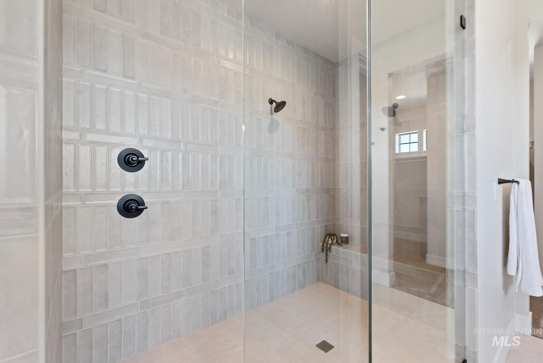 Bathroom with tiled shower
