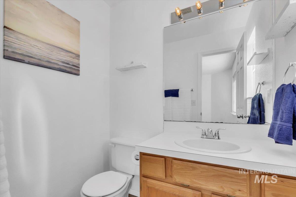 Bathroom with vanity and toilet