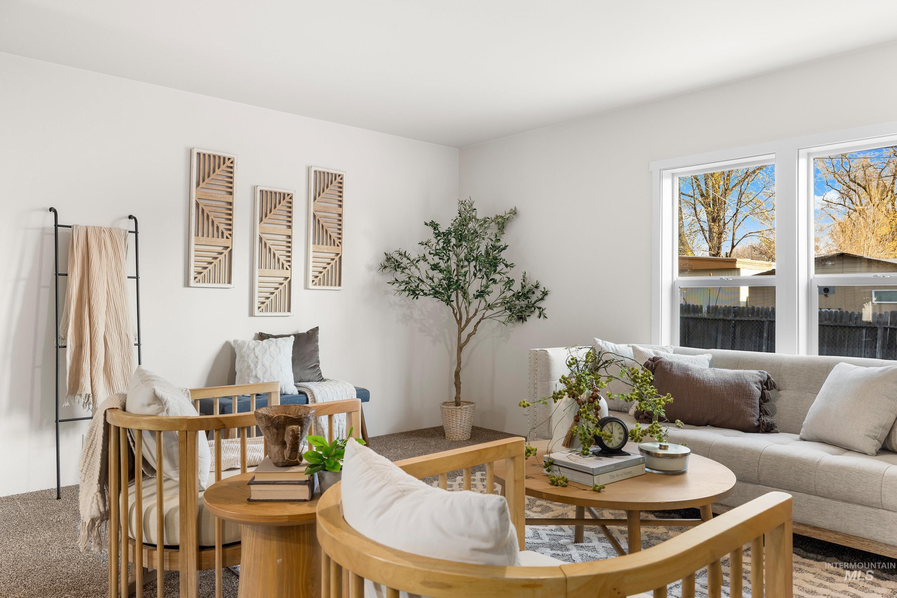 Living area featuring carpet flooring