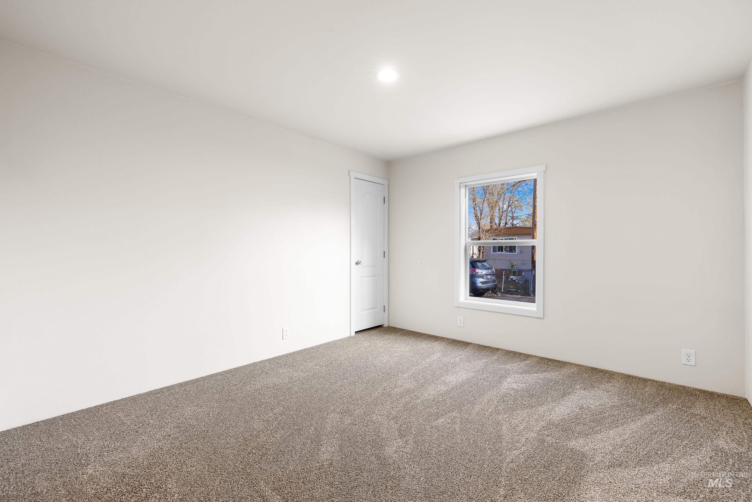 Empty room featuring carpet