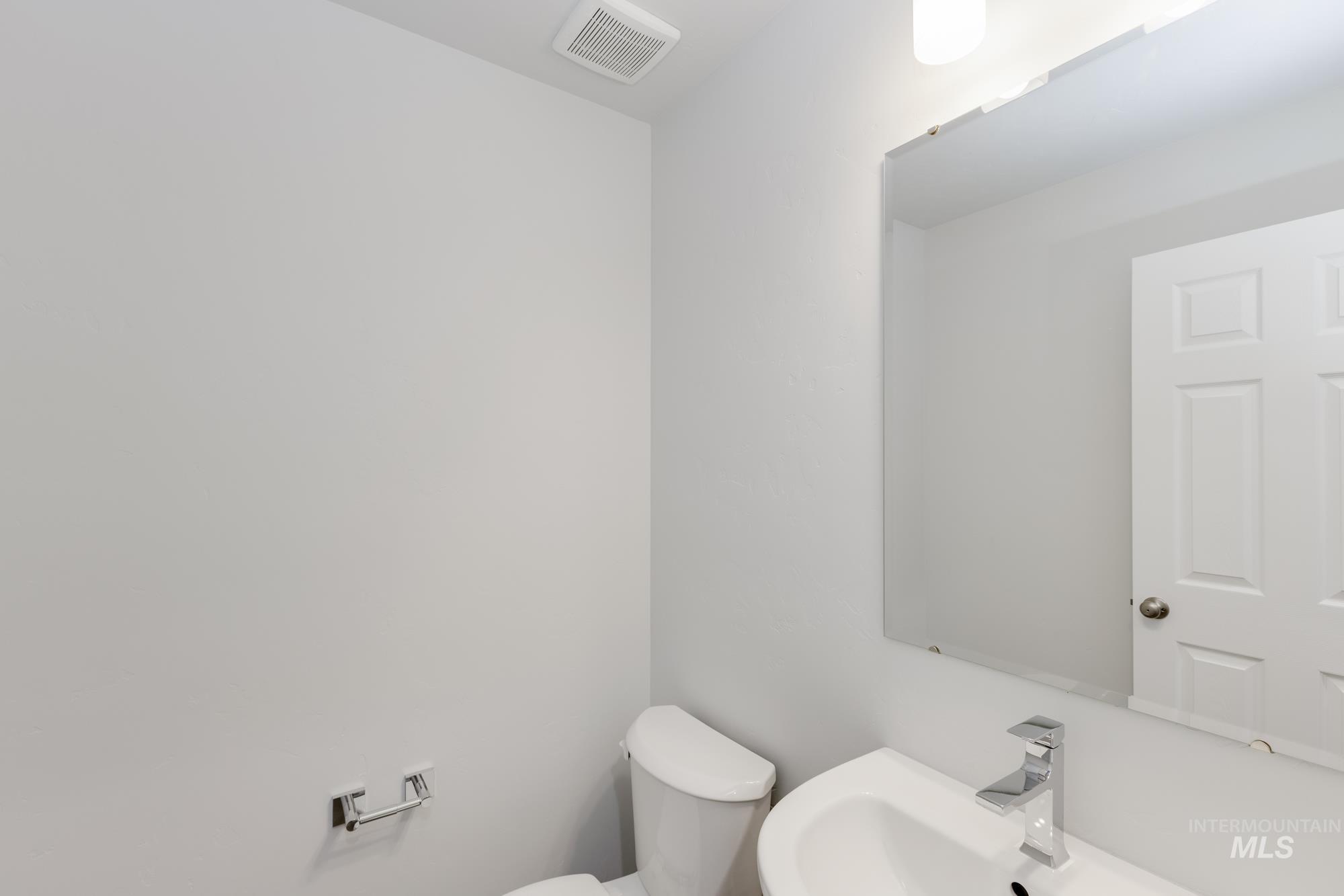 Bathroom with toilet and a sink